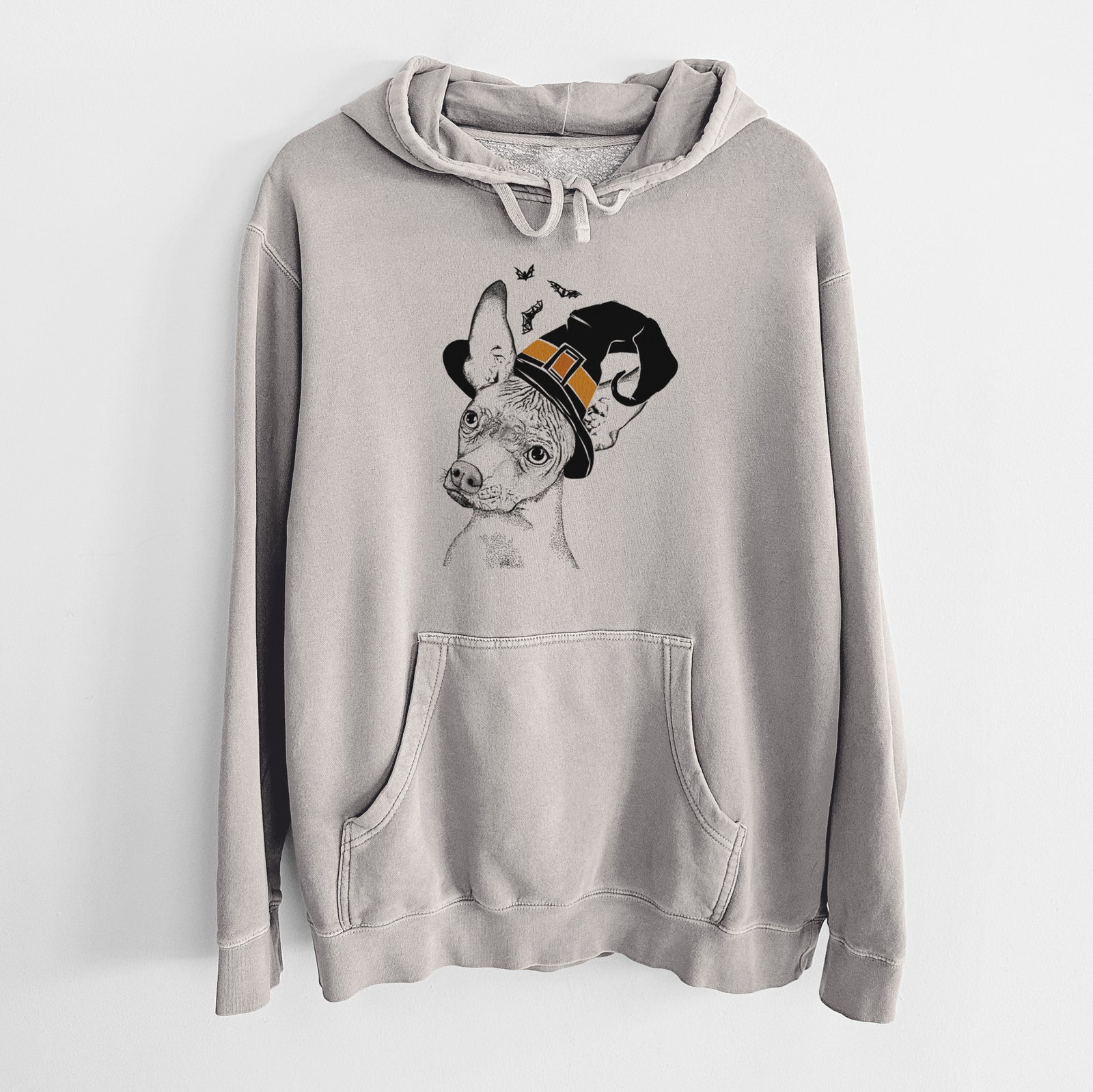 Hand-drawn sketch of Kahlo the Xoloitzcuintli wearing a witch hat on a Cement Unisex pigment dyed hoodie