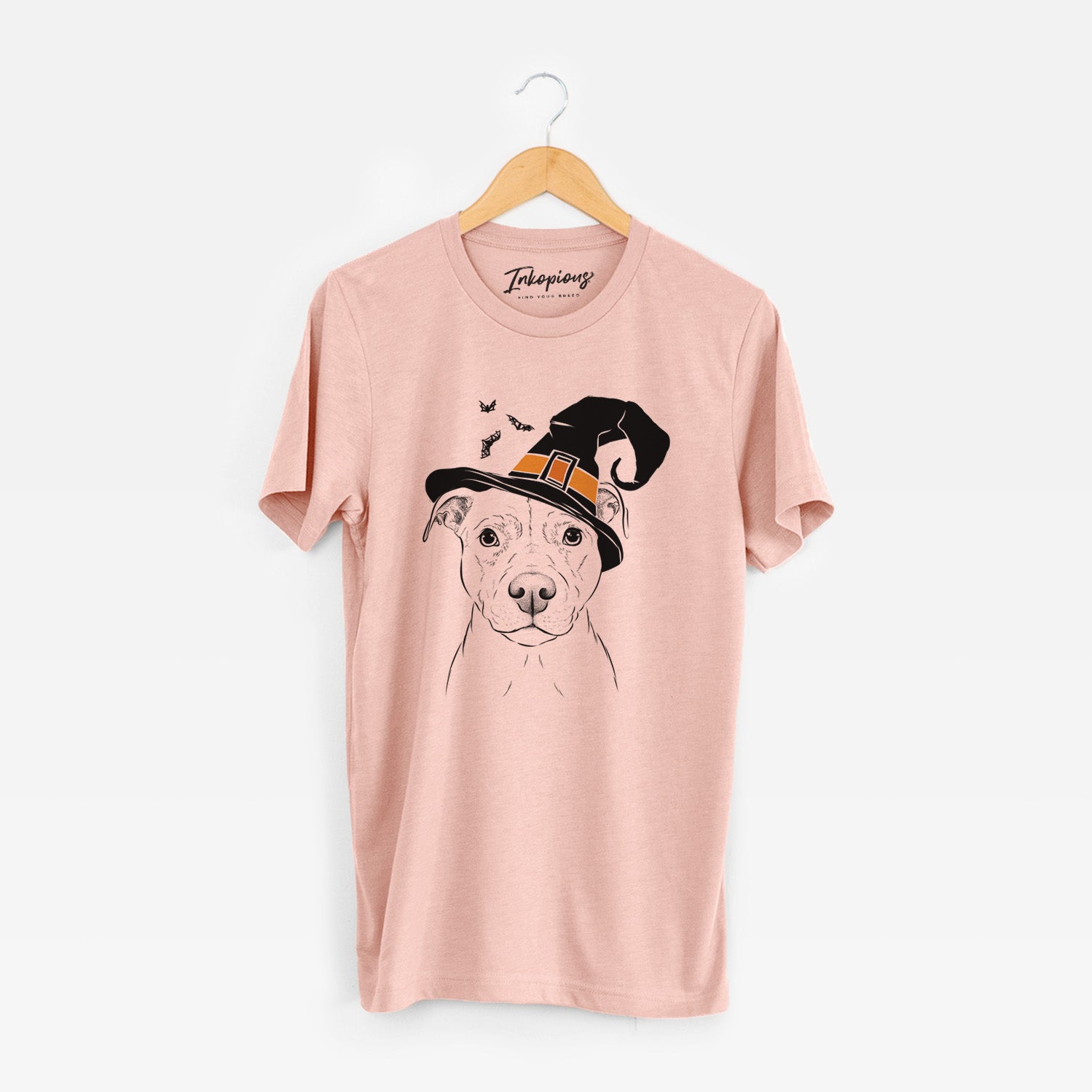 Hand-drawn sketch of Khaleesi the Pitbull wearing a witch hat on a Peach Unisex crewneck