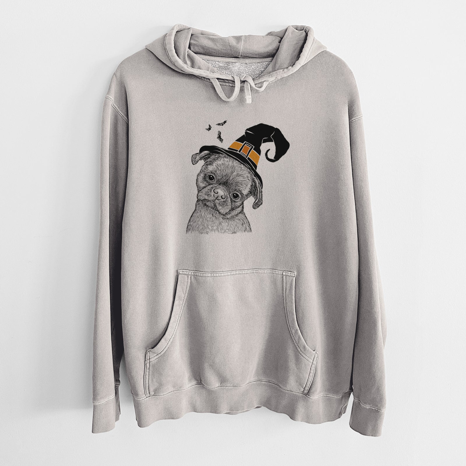 Hand-drawn sketch of Koko the Shih Tzu wearing a witch hat on a Cement Unisex pigment dyed hoodie