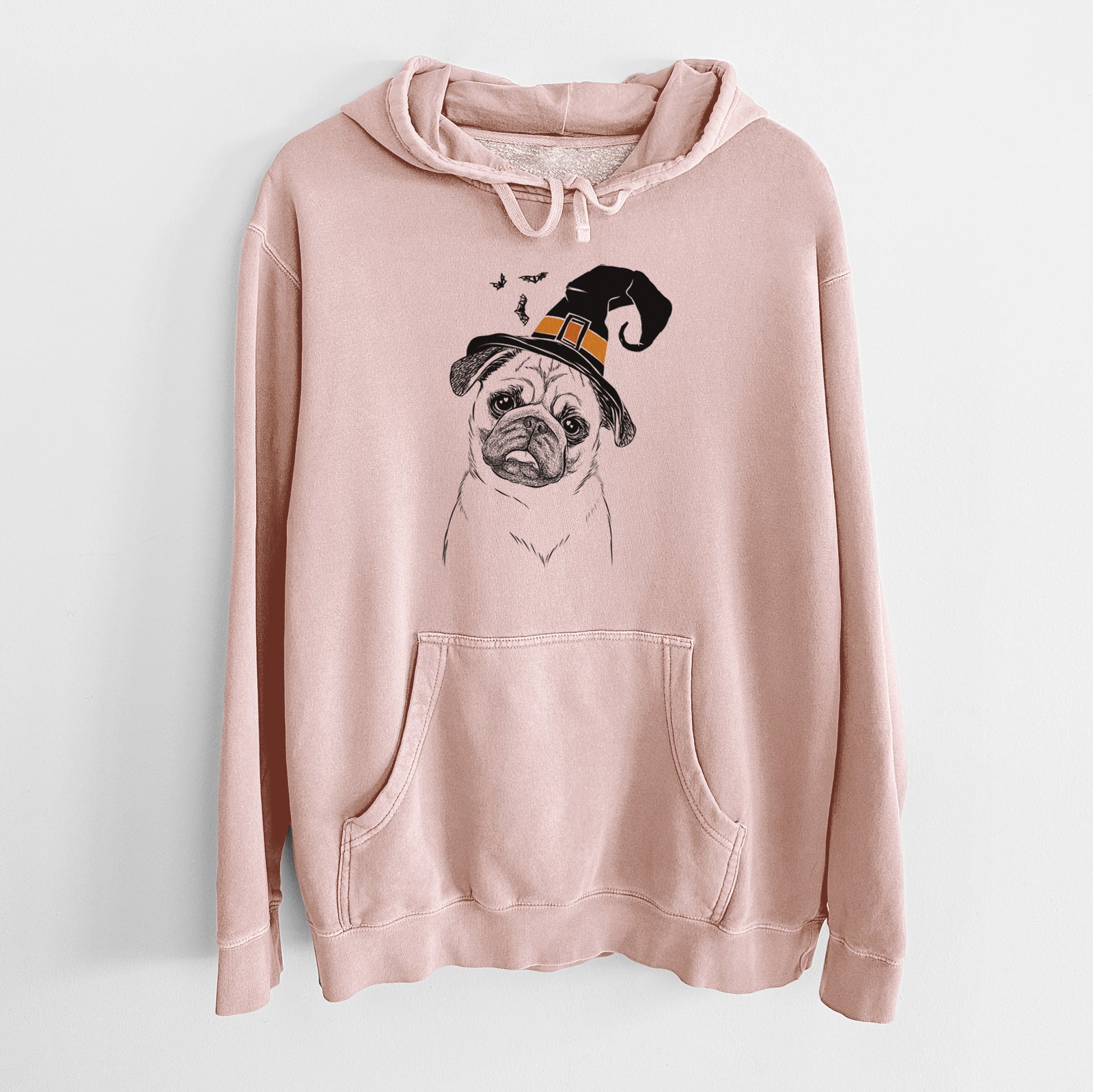 Hand-drawn sketch of Macy the Pug wearing a witch hat on a Dusty Pink Unisex pigment dyed hoodie