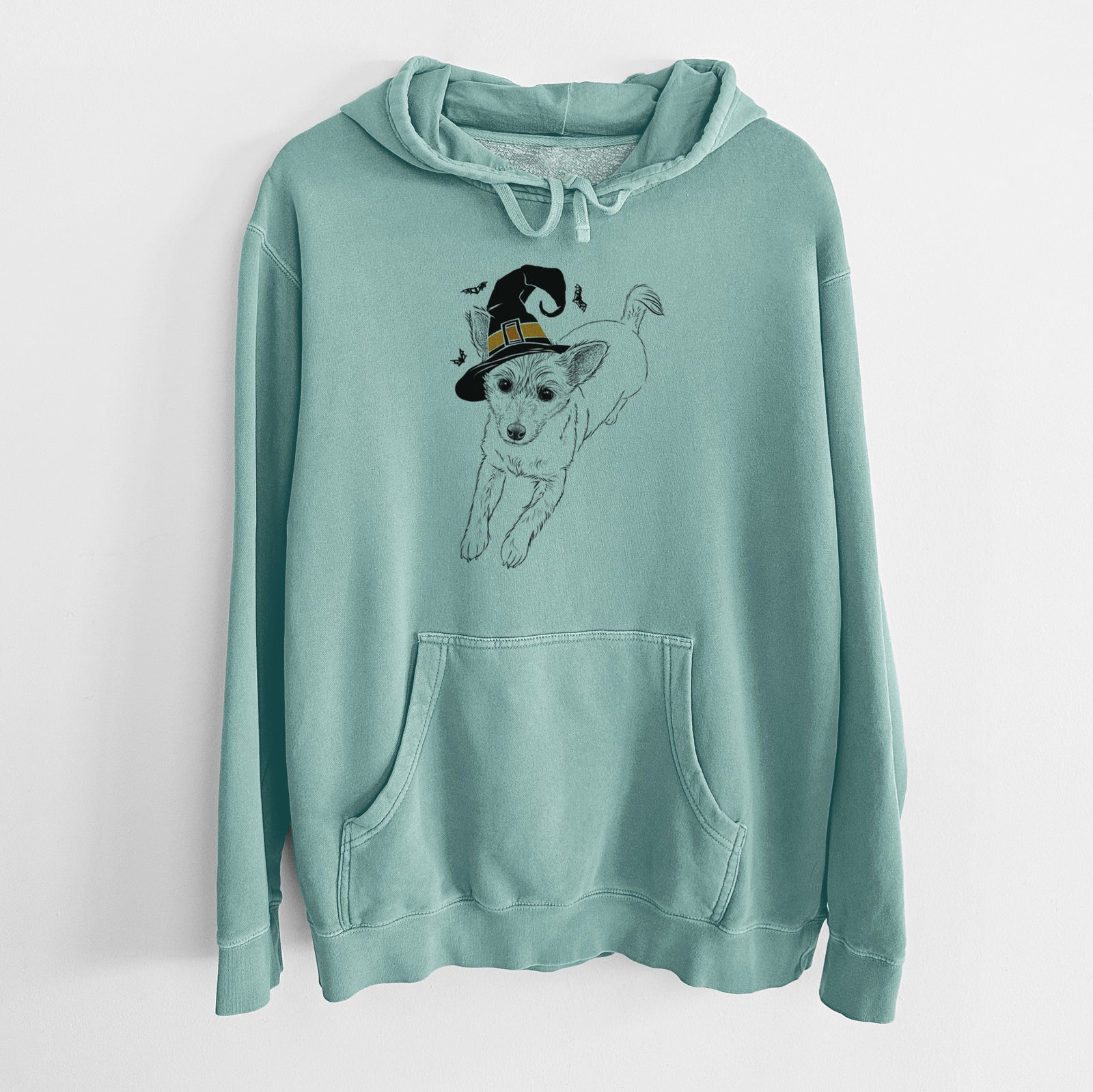 Hand-drawn sketch of Maisie the Terrier Mix wearing a witch hat on a Mint Unisex pigment dyed hoodie