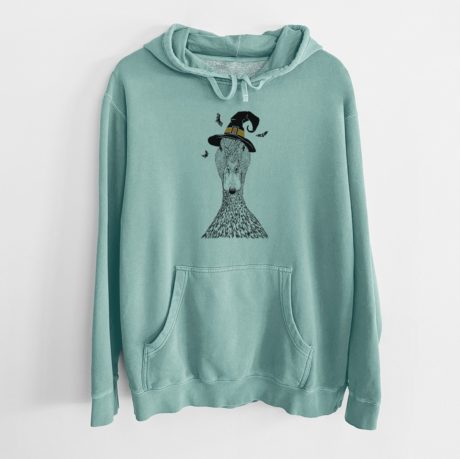 Hand-drawn sketch of Marge the Mallard Duck wearing a witch hat on a Mint Unisex pigment dyed hoodie