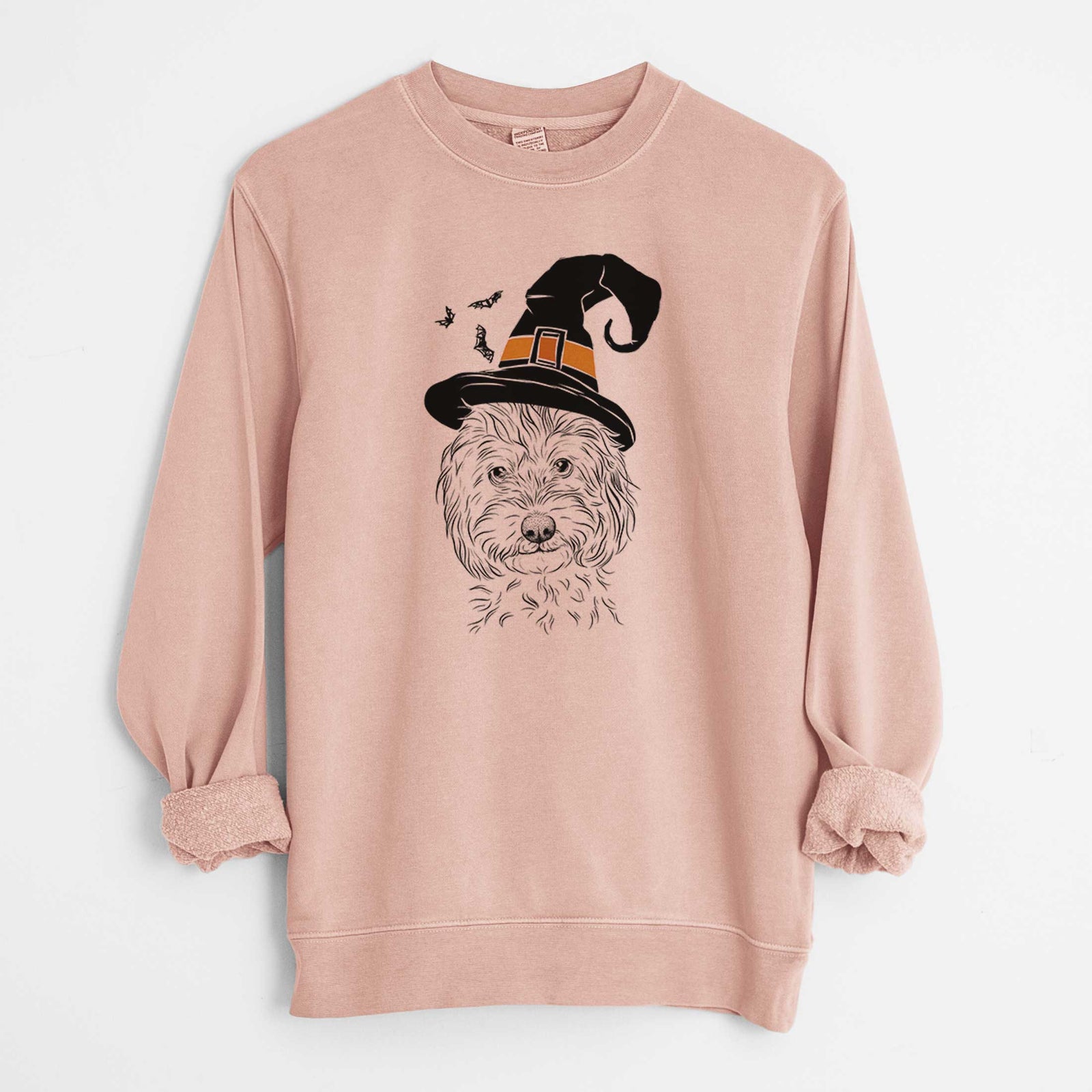 Hand-drawn sketch of Mason the Cavapoo wearing a witch hat on a Dusty Pink Unisex pigment dyed crew sweatshirt