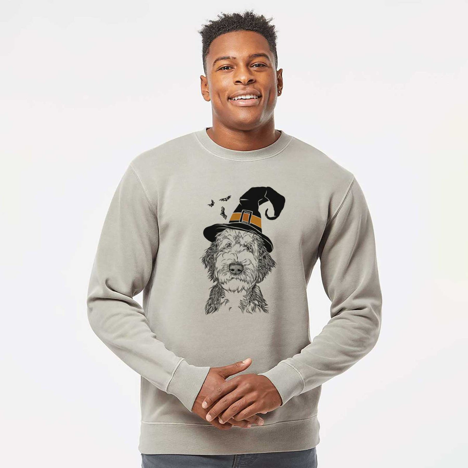 Hand-drawn sketch of Milo Fluff the Sheepadoodle wearing a witch hat on a Cement Unisex pigment dyed crew sweatshirt