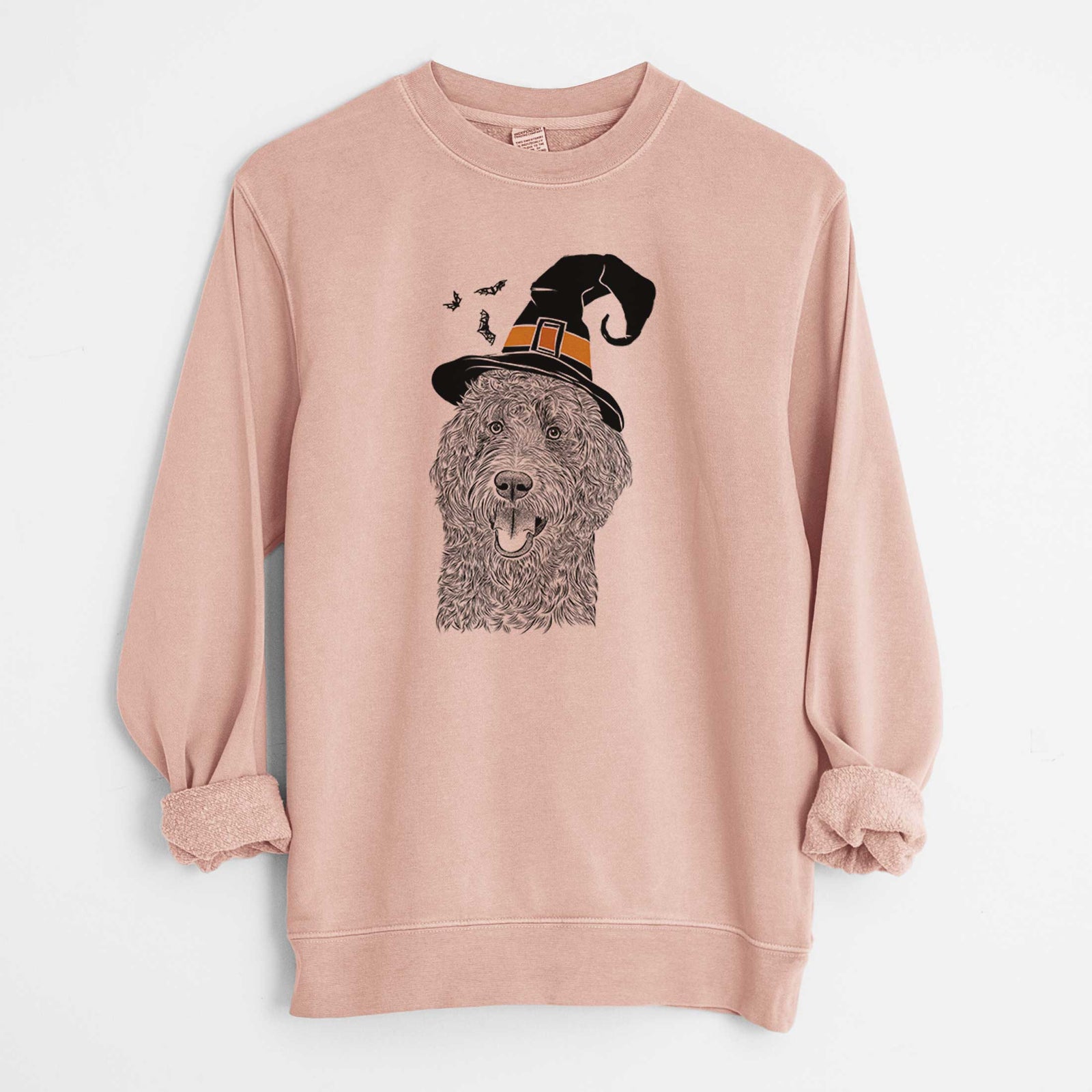 Hand-drawn sketch of Murr Dog the Labradoodle wearing a witch hat on a Dusty Pink Unisex pigment dyed crew sweatshirt