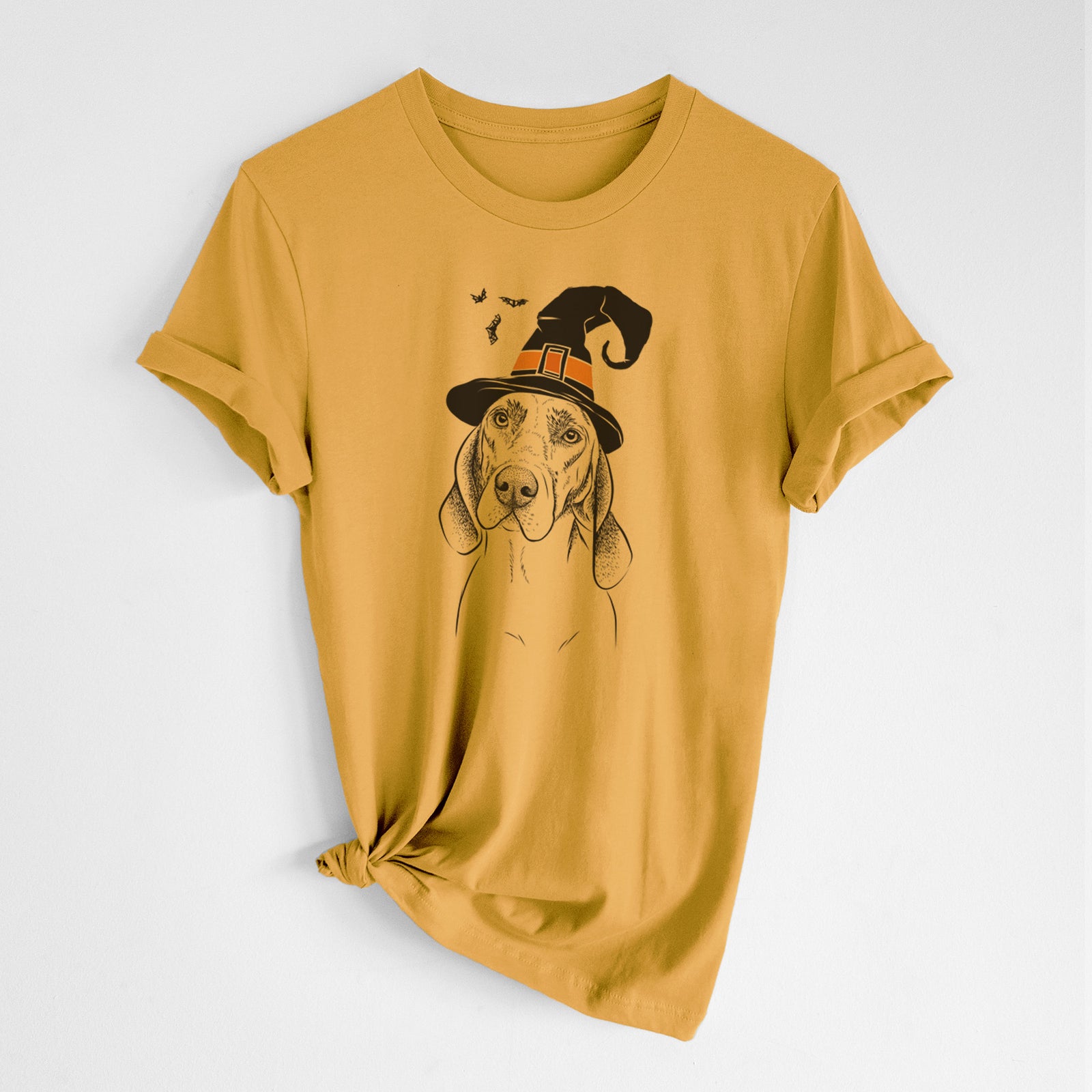 Hand-drawn sketch of Norman the Plott Hound wearing a witch hat on a Mustard Unisex crewneck, worn by a woman