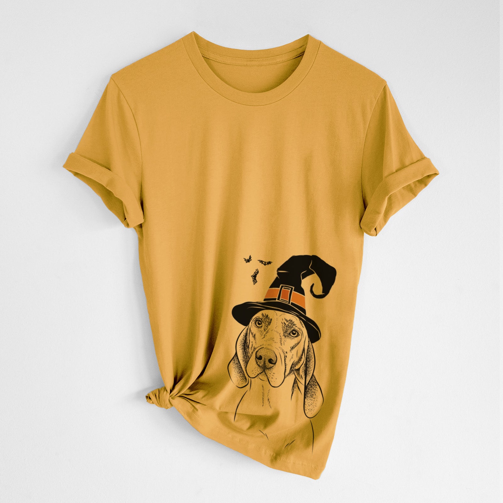 Hand-drawn sketch of Norman the Plott Hound wearing a witch hat on a Mustard Unisex crewneck, worn by a woman