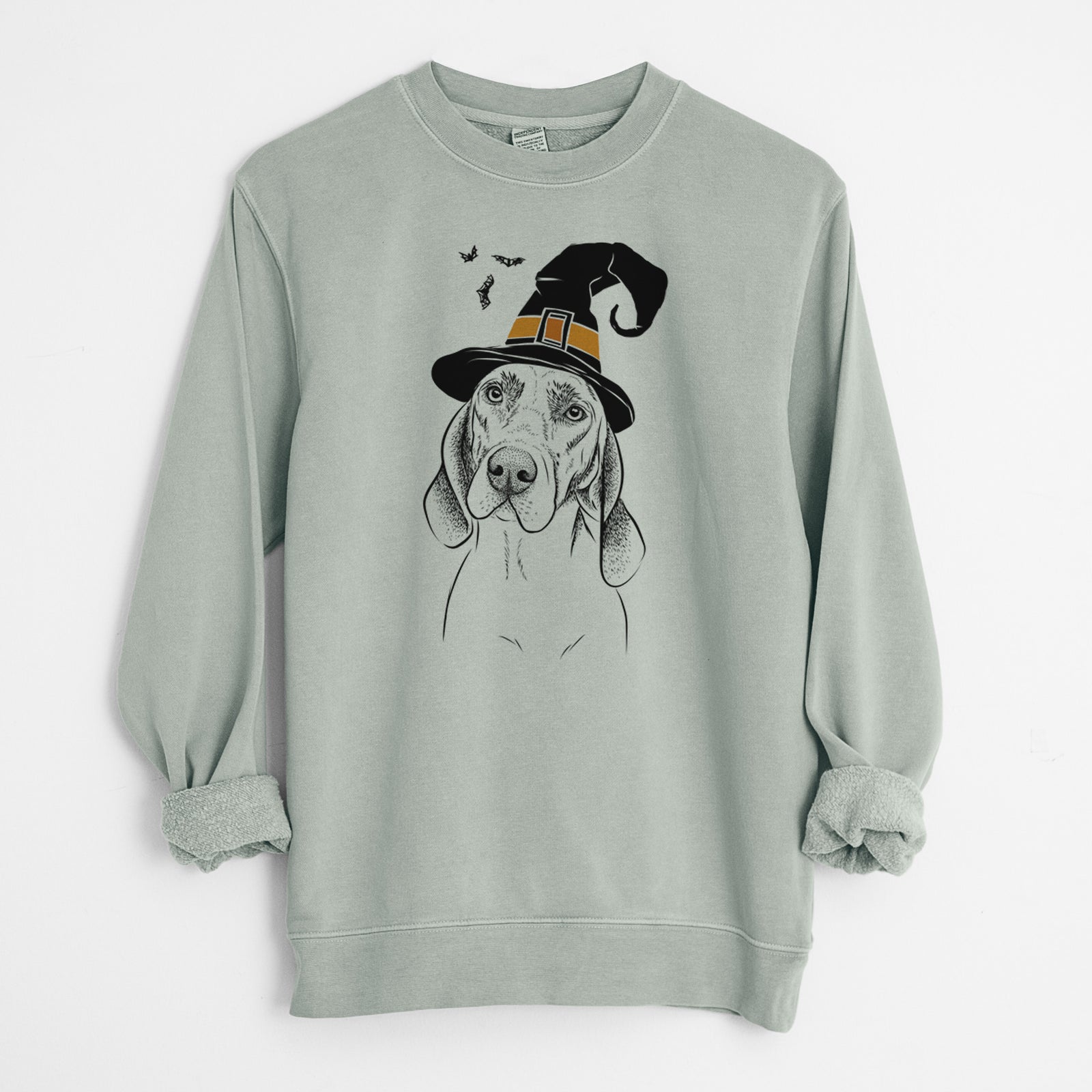 Hand-drawn sketch of Norman the Plott Hound wearing a witch hat on a Sage Unisex pigment dyed crew sweatshirt
