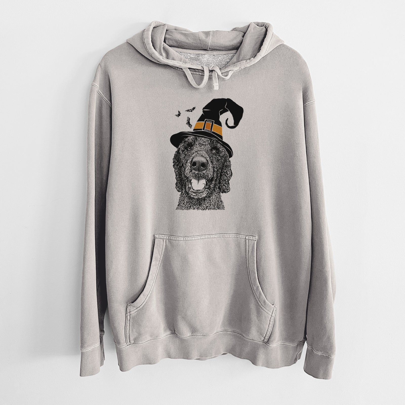 Hand-drawn sketch of Obi James the Goldendoodle wearing a witch hat on a Cement Unisex pigment dyed hoodie