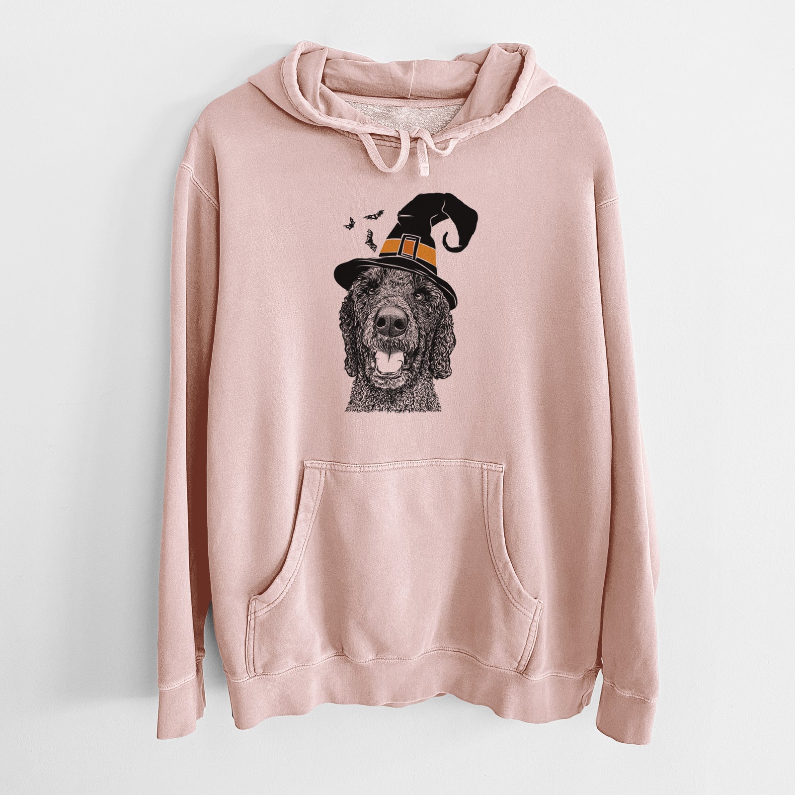 Hand-drawn sketch of Obi James the Goldendoodle wearing a witch hat on a Dusty Pink Unisex pigment dyed hoodie