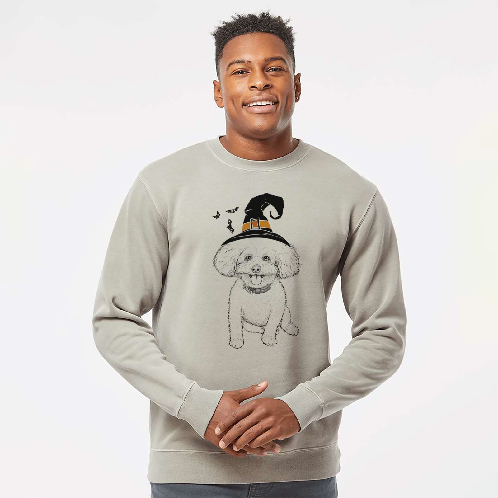 Hand-drawn sketch of Peyton the Bichon Frise wearing a witch hat on a Cement Unisex pigment dyed crew sweatshirt