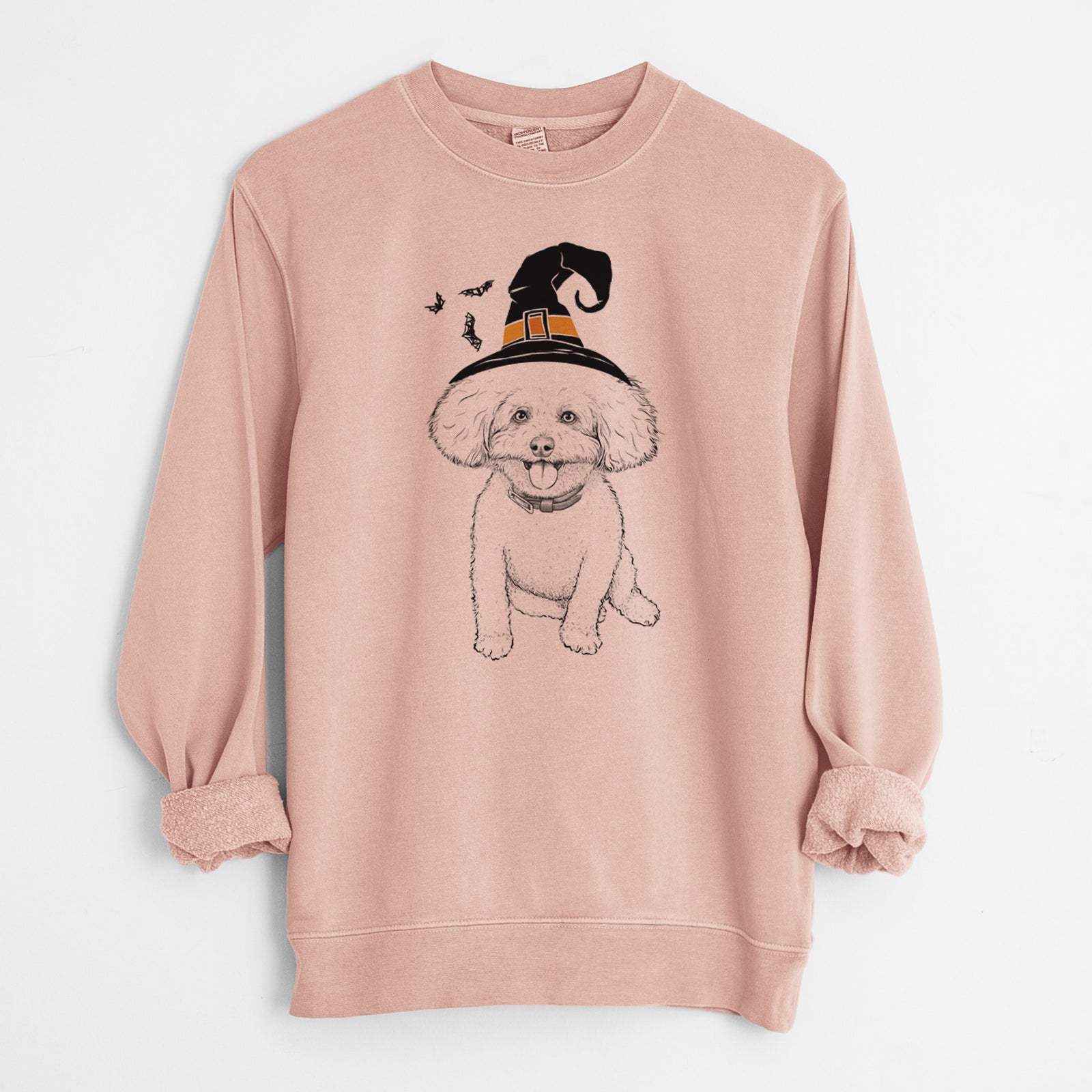 Hand-drawn sketch of Peyton the Bichon Frise wearing a witch hat on a Dusty Pink Unisex pigment dyed crew sweatshirt