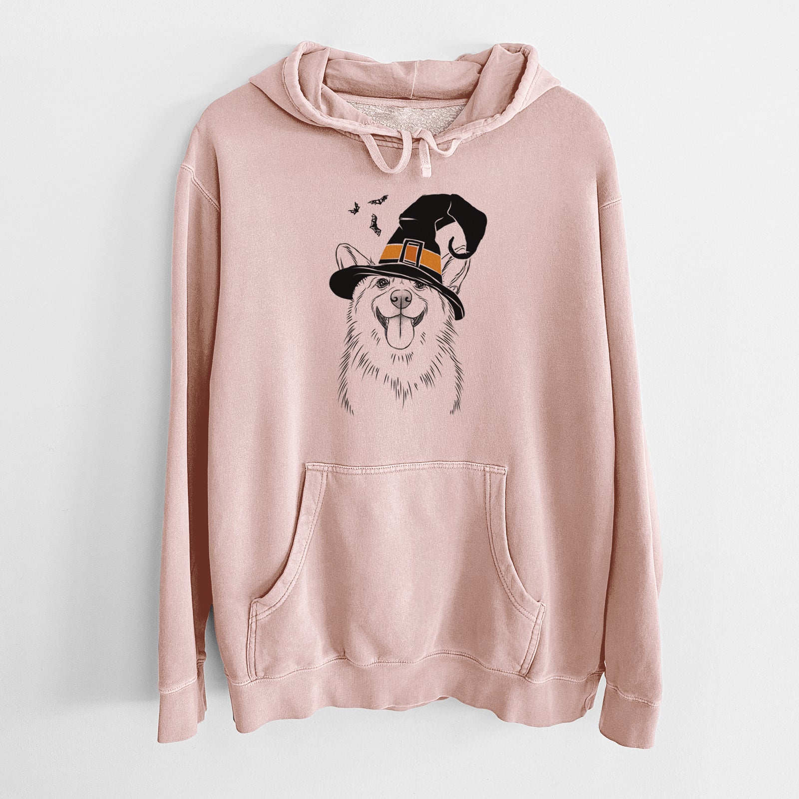 Hand-drawn sketch of Porter the Pembroke Welsh Corgi wearing a witch hat on a Dusty Pink Unisex pigment dyed hoodie
