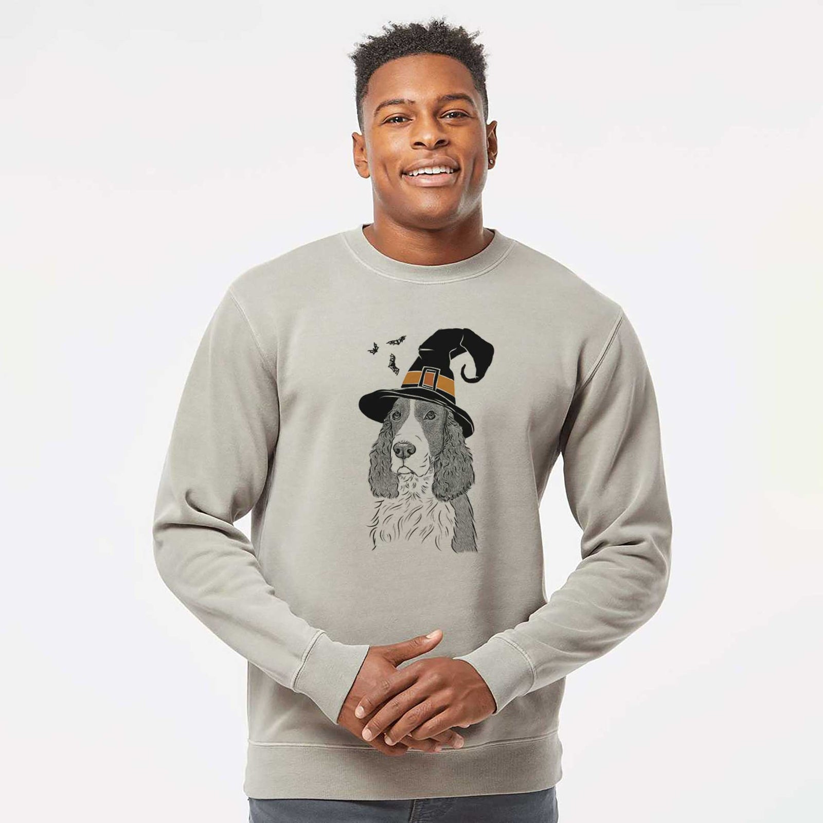 Hand-drawn sketch of Quincy the English Springer Spaniel wearing a witch hat on a Cement Unisex pigment dyed crew sweatshirt