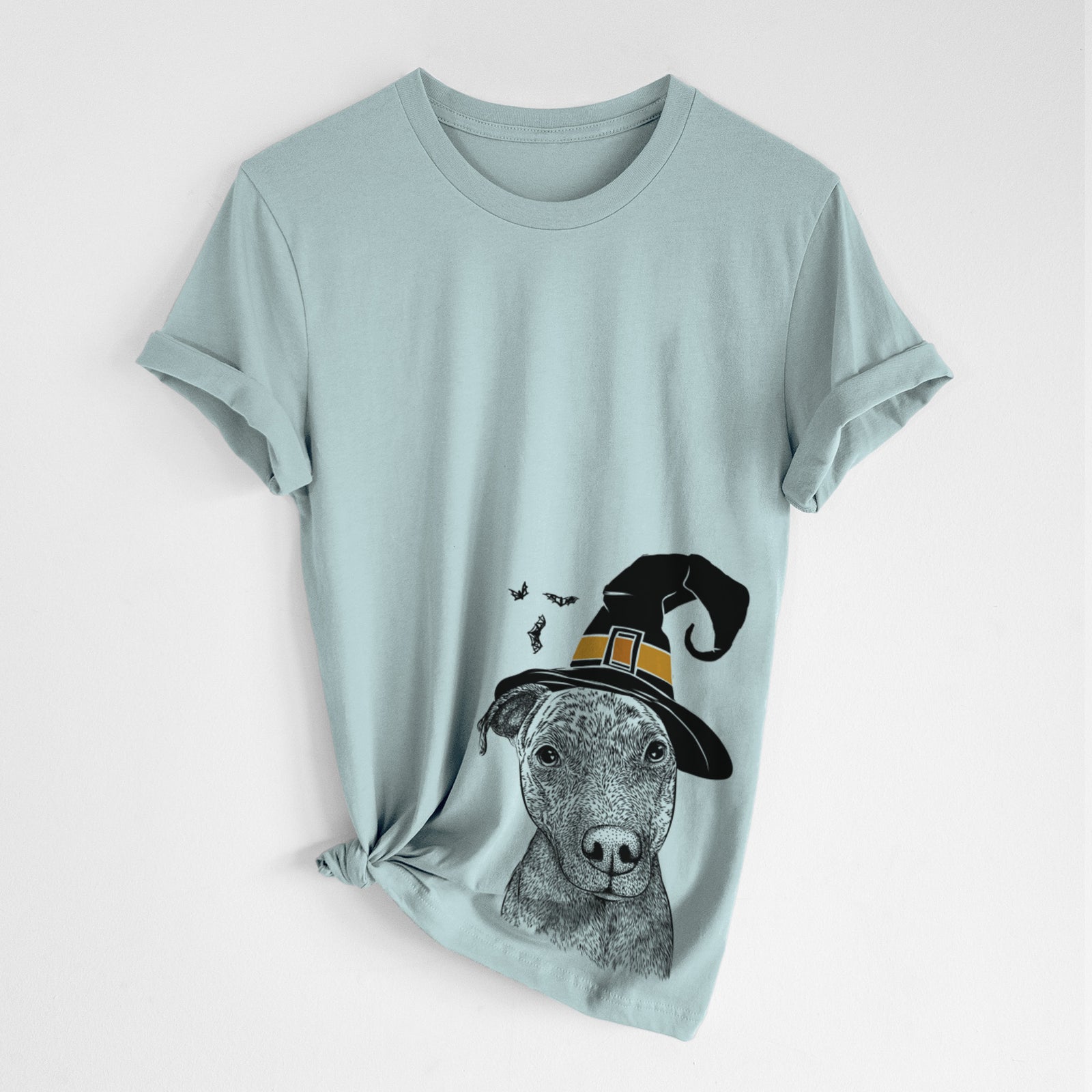 Hand-drawn sketch of Reeses the Pitbull wearing a witch hat on a Dusty Blue Unisex crewneck, worn by a woman