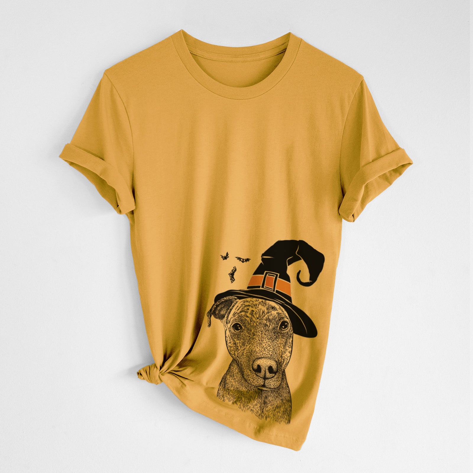 Hand-drawn sketch of Reeses the Pitbull wearing a witch hat on a Mustard Unisex crewneck, worn by a woman