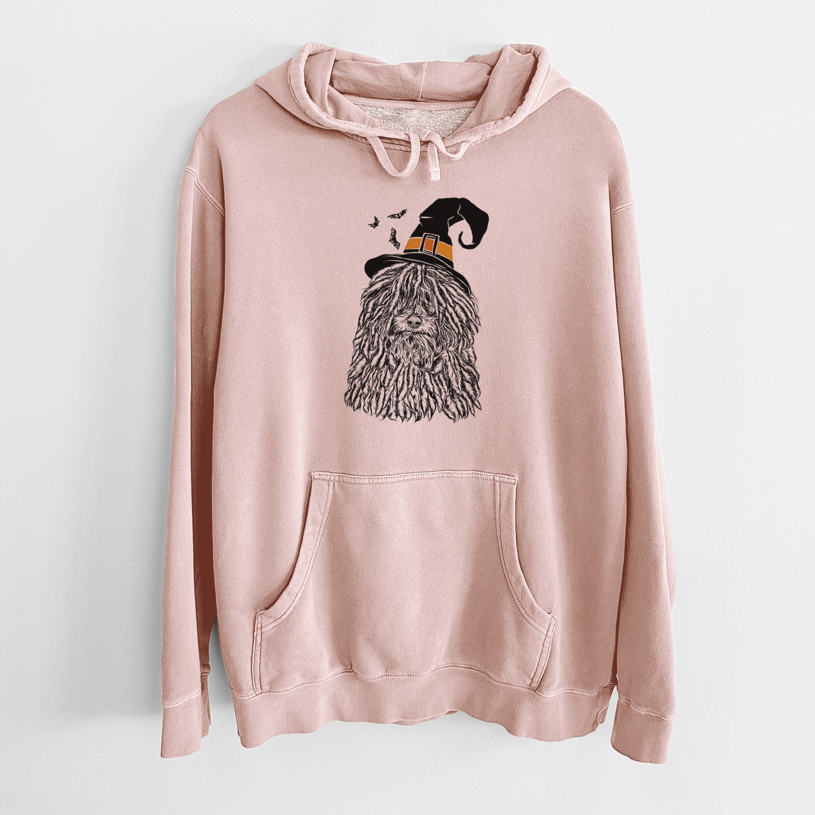 Hand-drawn sketch of Rezi the Puli wearing a witch hat on a Dusty Pink Unisex pigment dyed hoodie