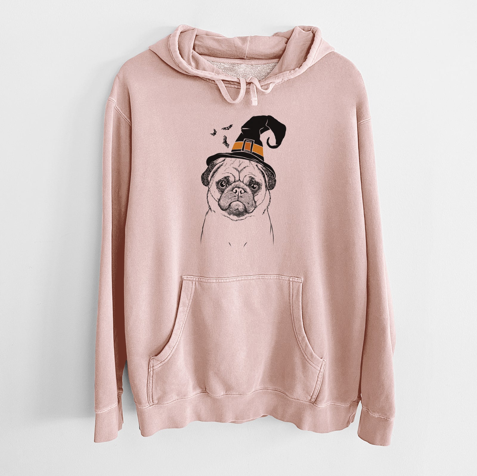 Hand-drawn sketch of Ruby the Pug wearing a witch hat on a Dusty Pink Unisex pigment dyed hoodie