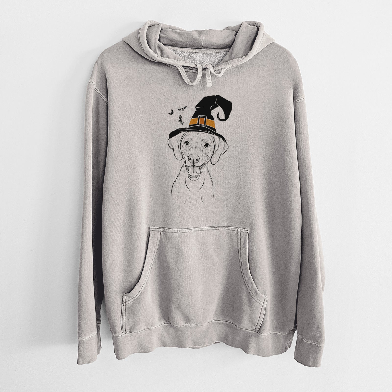 Hand-drawn sketch of Ruby the Vizsla wearing a witch hat on a Cement Unisex pigment dyed hoodie