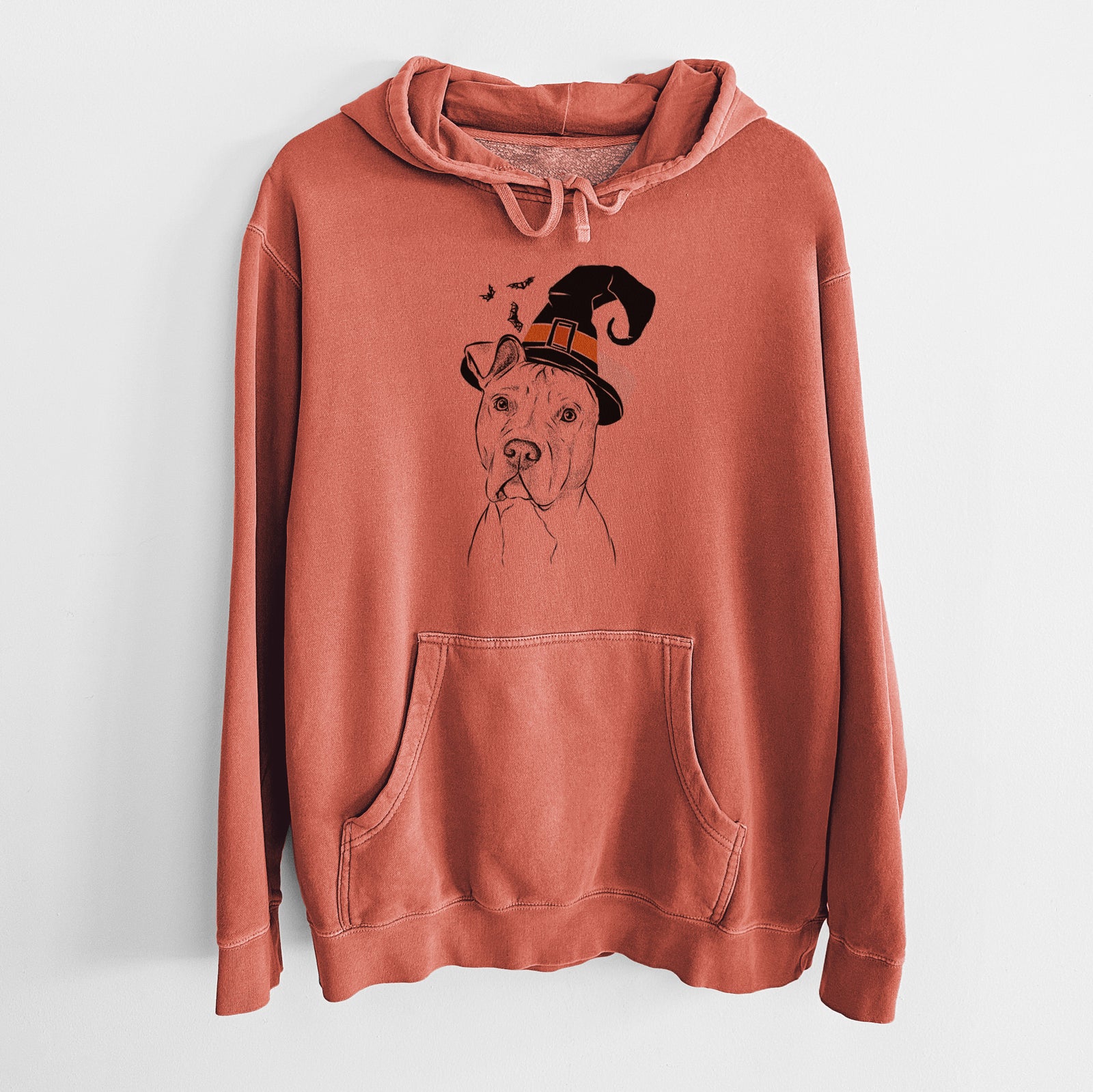Hand-drawn sketch of Scraps the American Staffordshire Mix wearing a witch hat on an Amber Unisex pigment dyed hoodie
