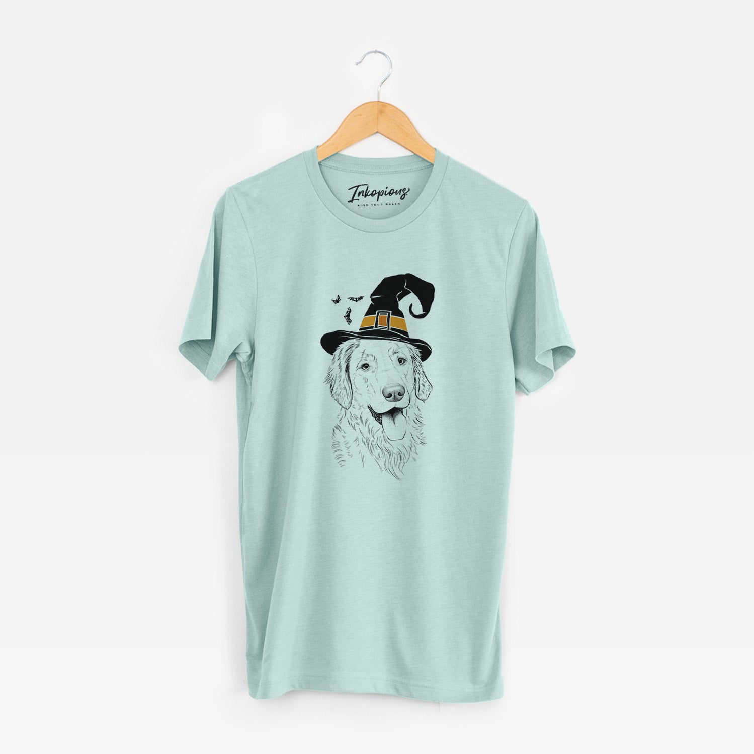 Hand-drawn sketch of Semba the Golden Retriever wearing a witch hat on a Heather Sage Unisex crewneck