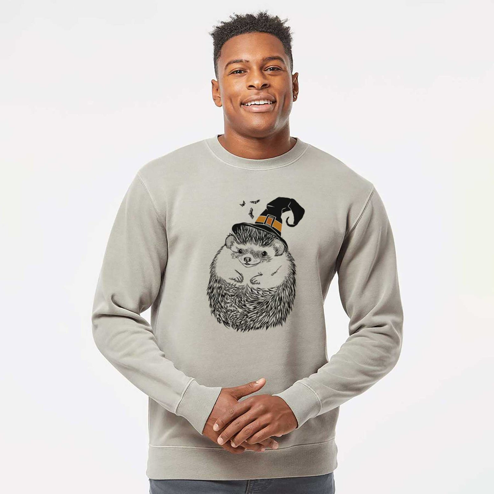 Hand-drawn sketch of Sid the Hedgehog wearing a witch hat on a Cement Unisex pigment dyed crew sweatshirt