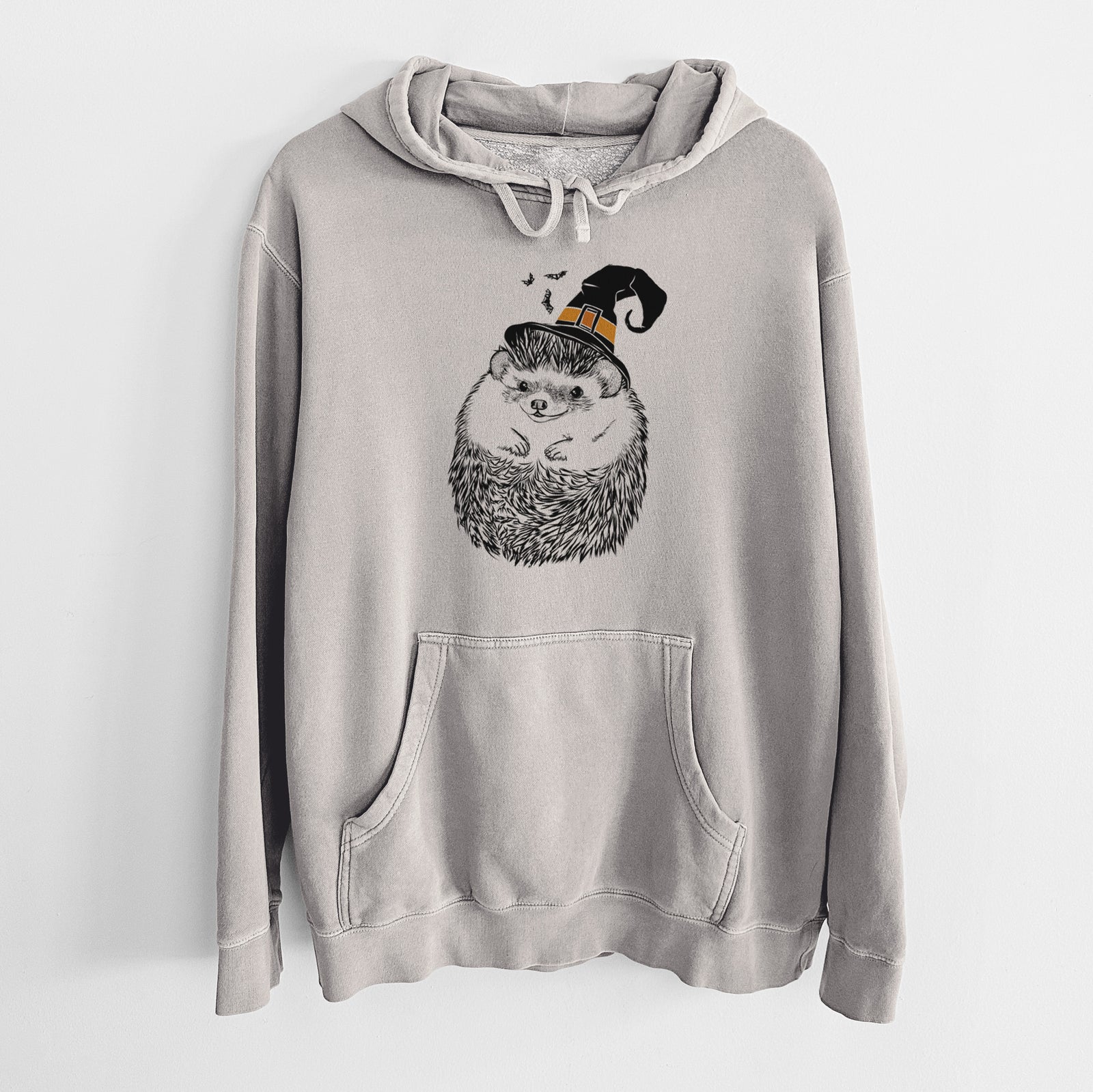 Hand-drawn sketch of Sid the Hedgehog wearing a witch hat on a Cement Unisex pigment dyed hoodie