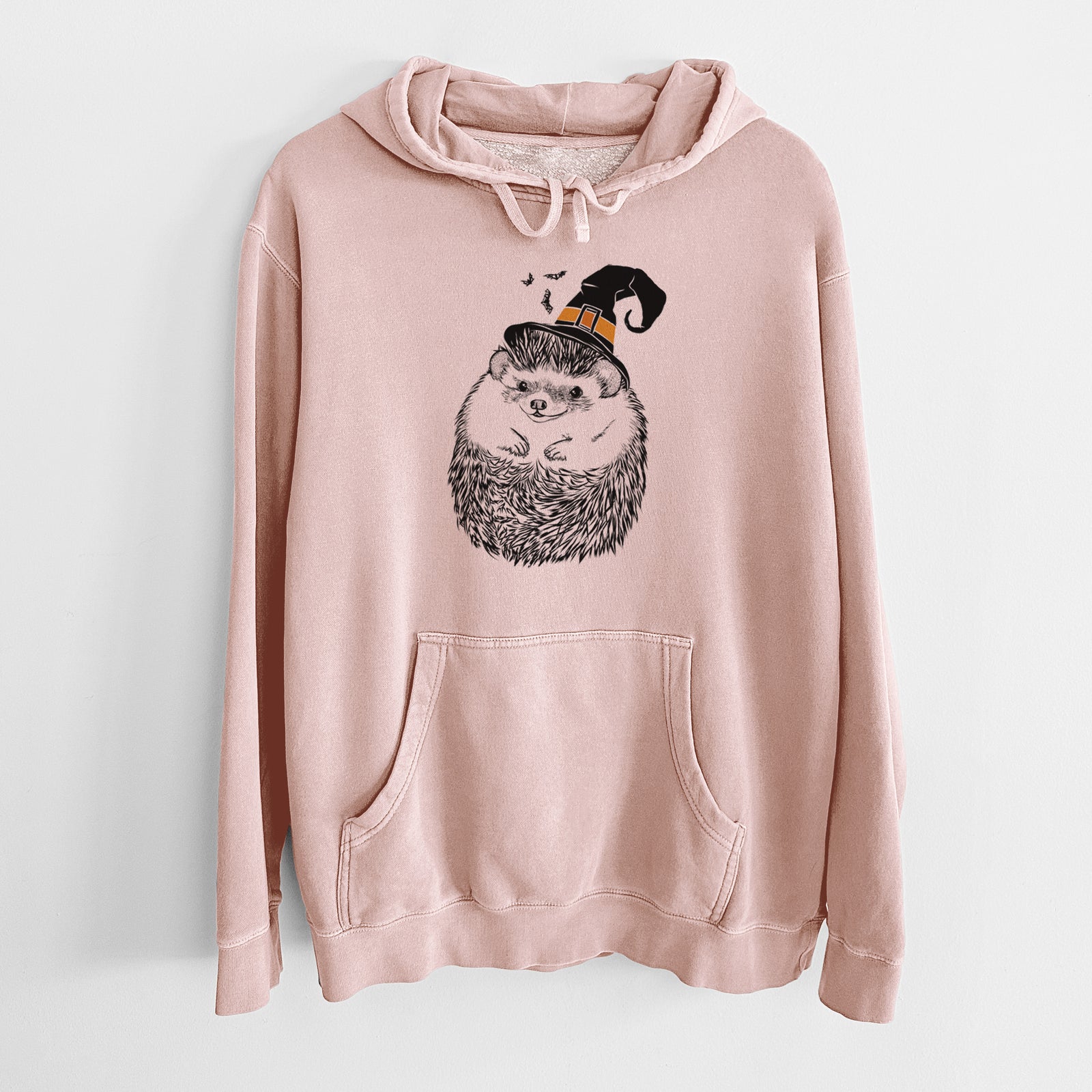 Hand-drawn sketch of Sid the Hedgehog wearing a witch hat on a Dusty Pink Unisex pigment dyed hoodie