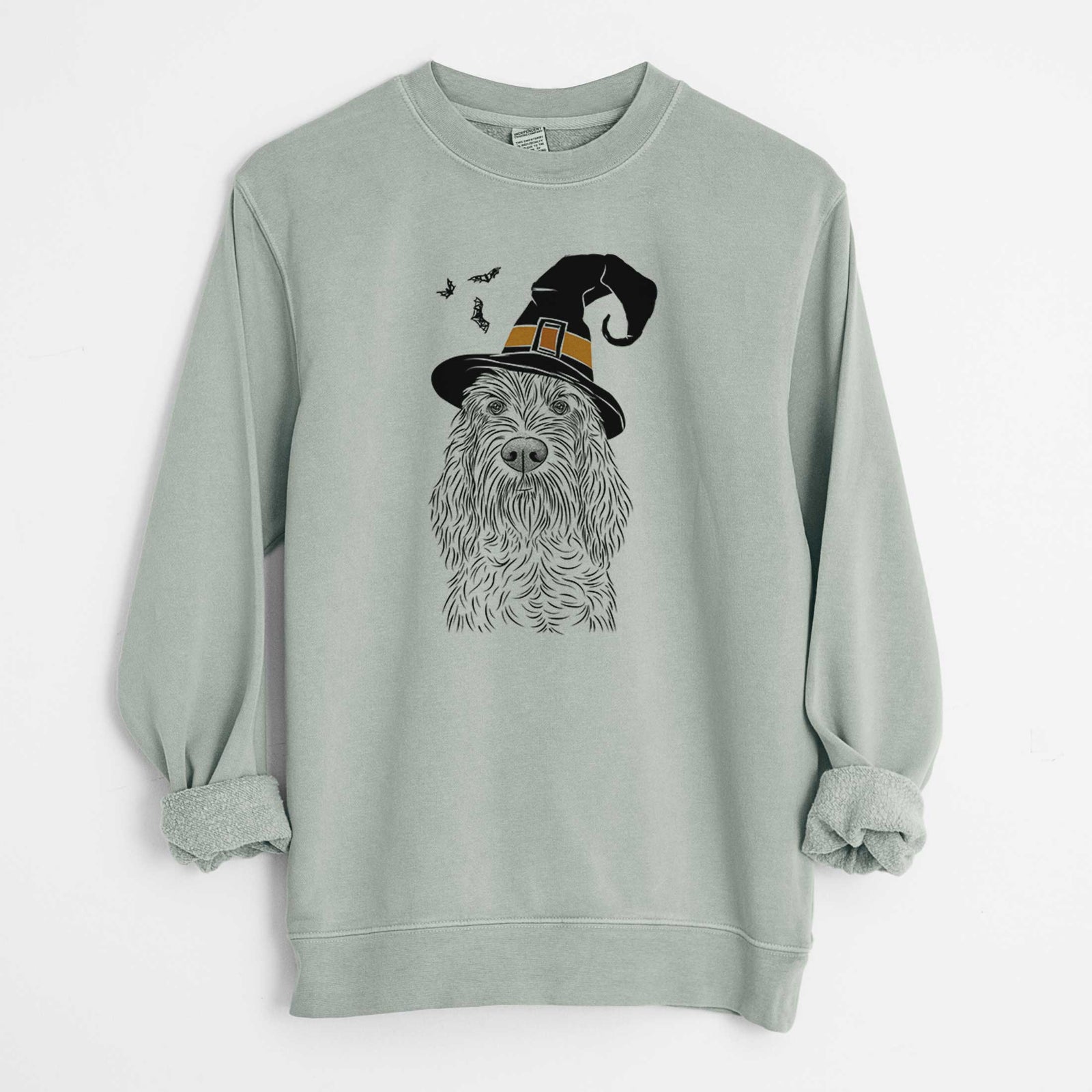 Hand-drawn sketch of Stefano the Spinone Italiano wearing a witch hat on a Sage Unisex pigment dyed crew sweatshirt