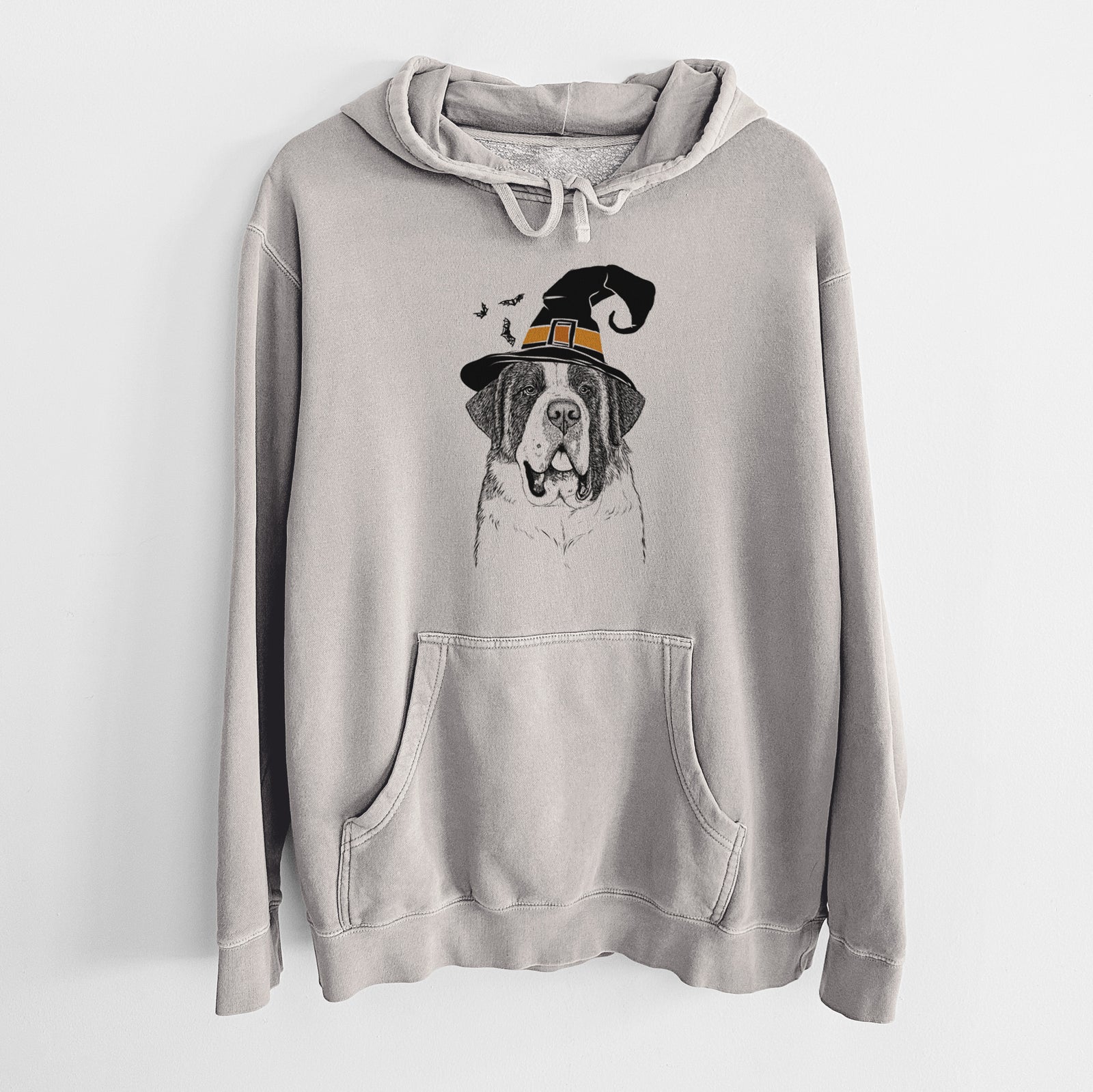 Hand-drawn sketch of Thor the Saint Bernard wearing a witch hat on a Cement Unisex pigment dyed hoodie