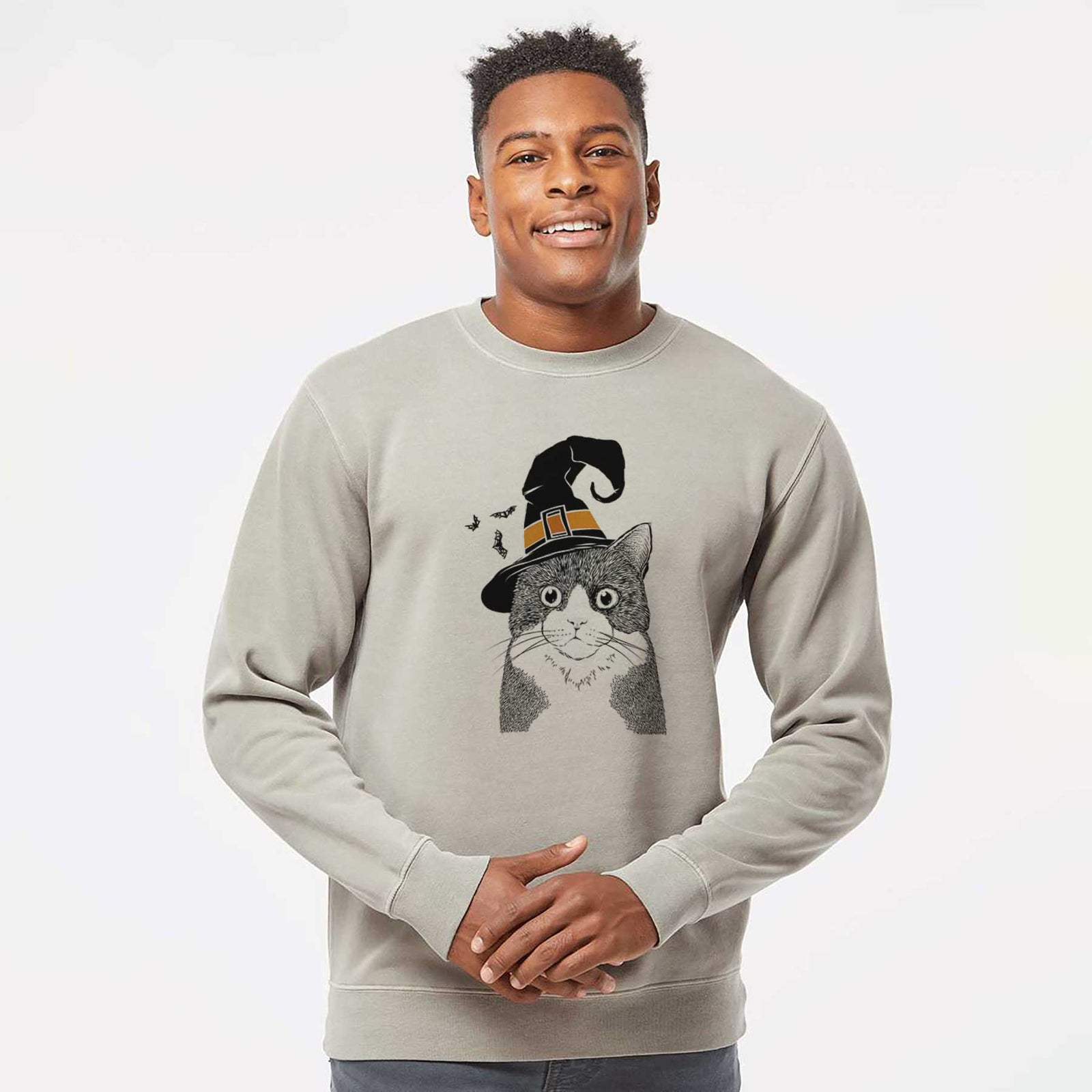 Hand-drawn sketch of Tux the Tuxedo Cat wearing a witch hat on a Cement Unisex pigment dyed crew sweatshirt
