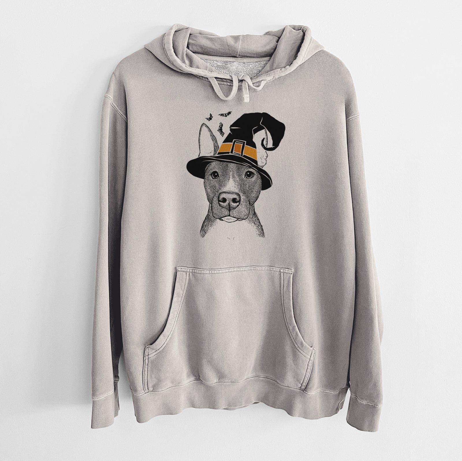 Hand-drawn sketch of Violet the Pitbull wearing a witch hat on a Cement Unisex pigment dyed hoodie