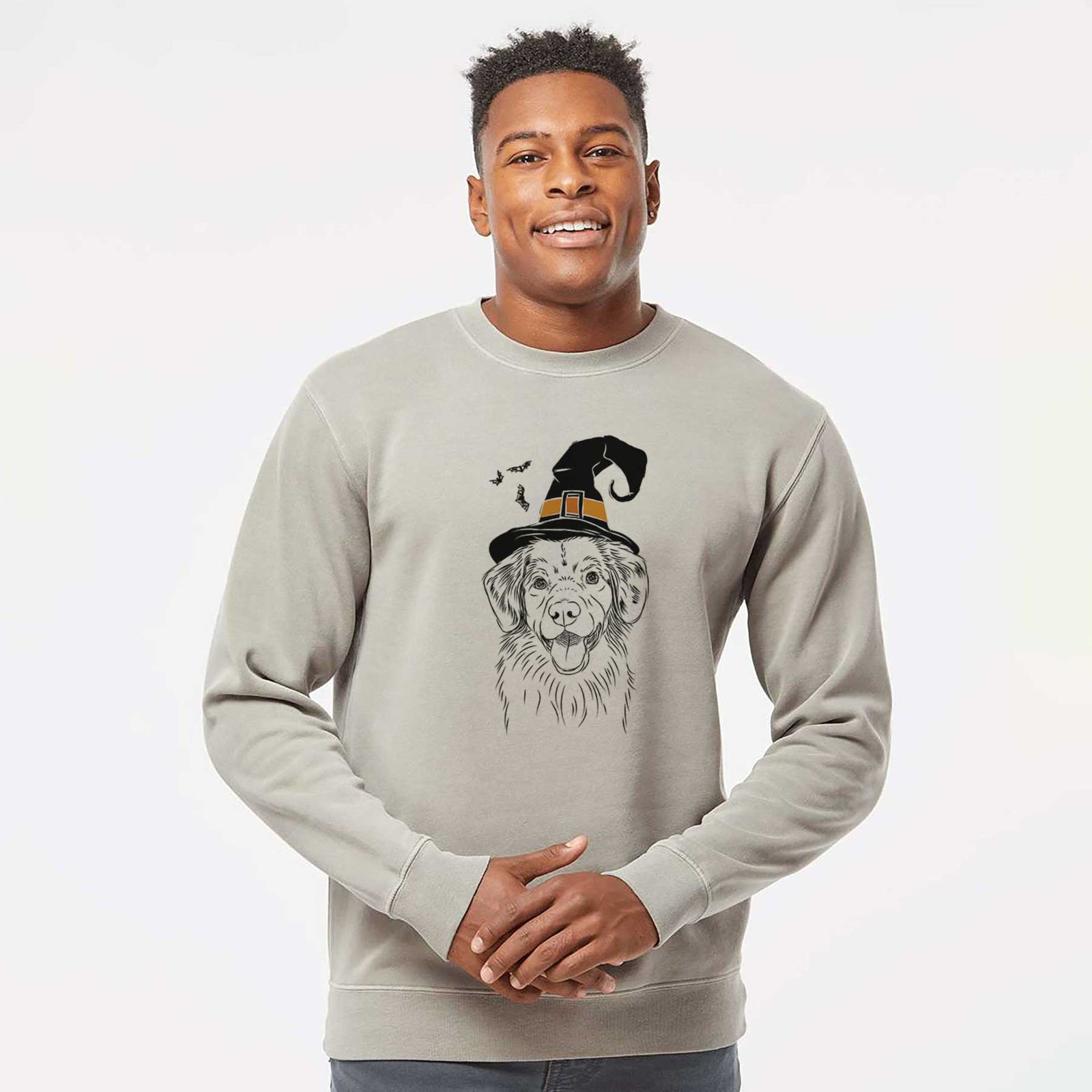 Hand-drawn sketch of Weston the Nova Scotia Duck Tolling Retriever wearing a witch hat on a Cement Unisex pigment dyed crew sweatshirt