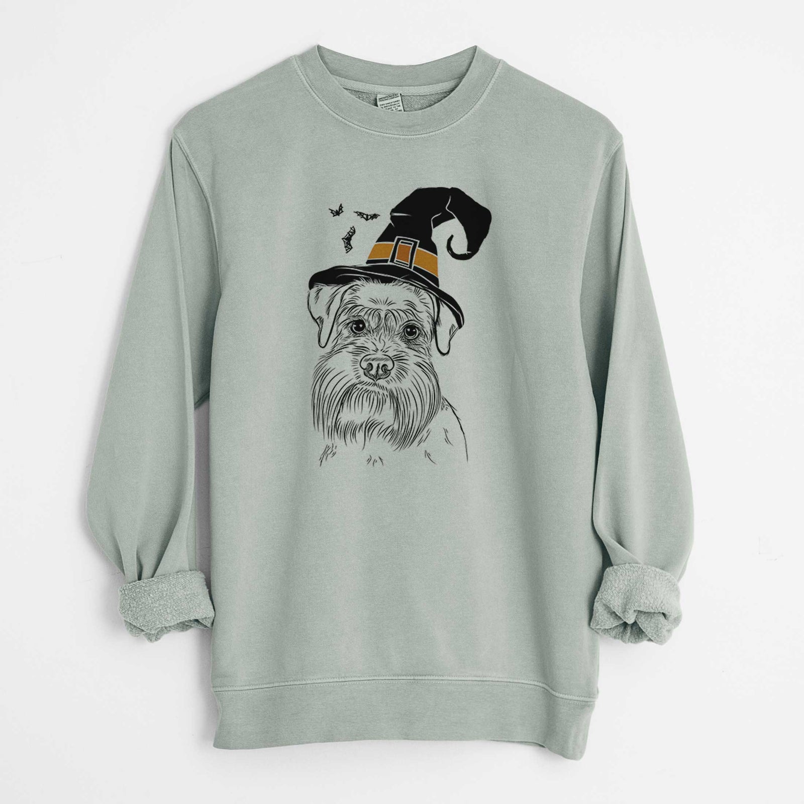 Hand-drawn sketch of Wrigley the Schnauzer wearing a witch hat on a Sage Unisex pigment dyed crew sweatshirt