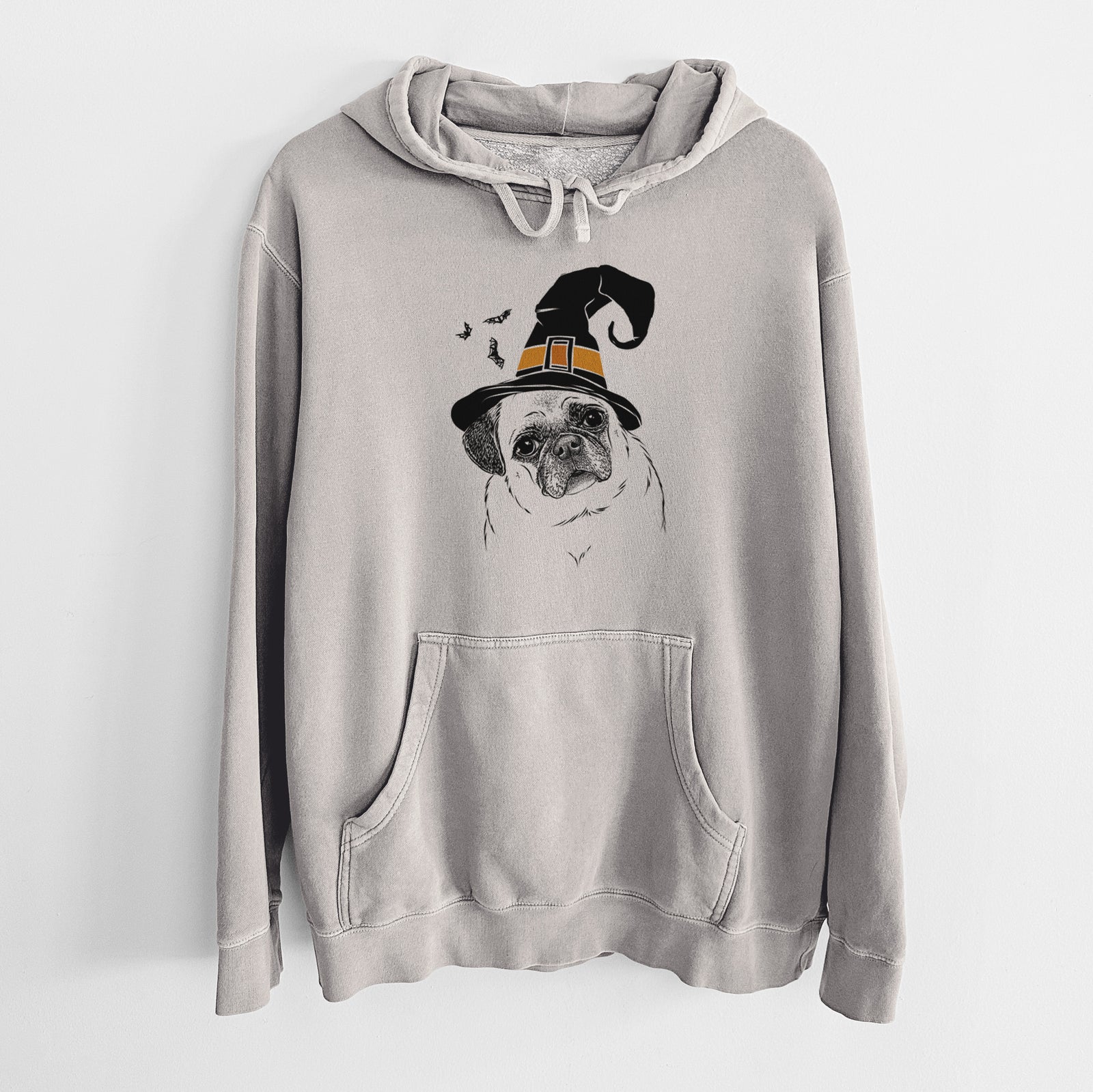 Hand-drawn sketch of Zoey the Pug wearing a witch hat on a Cement Unisex pigment dyed hoodie