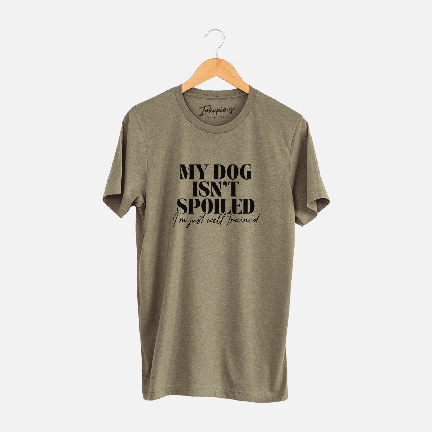 'My Dog Isn't Spoiled I'm Just Well Trained' design on an Olive Unisex crewneck