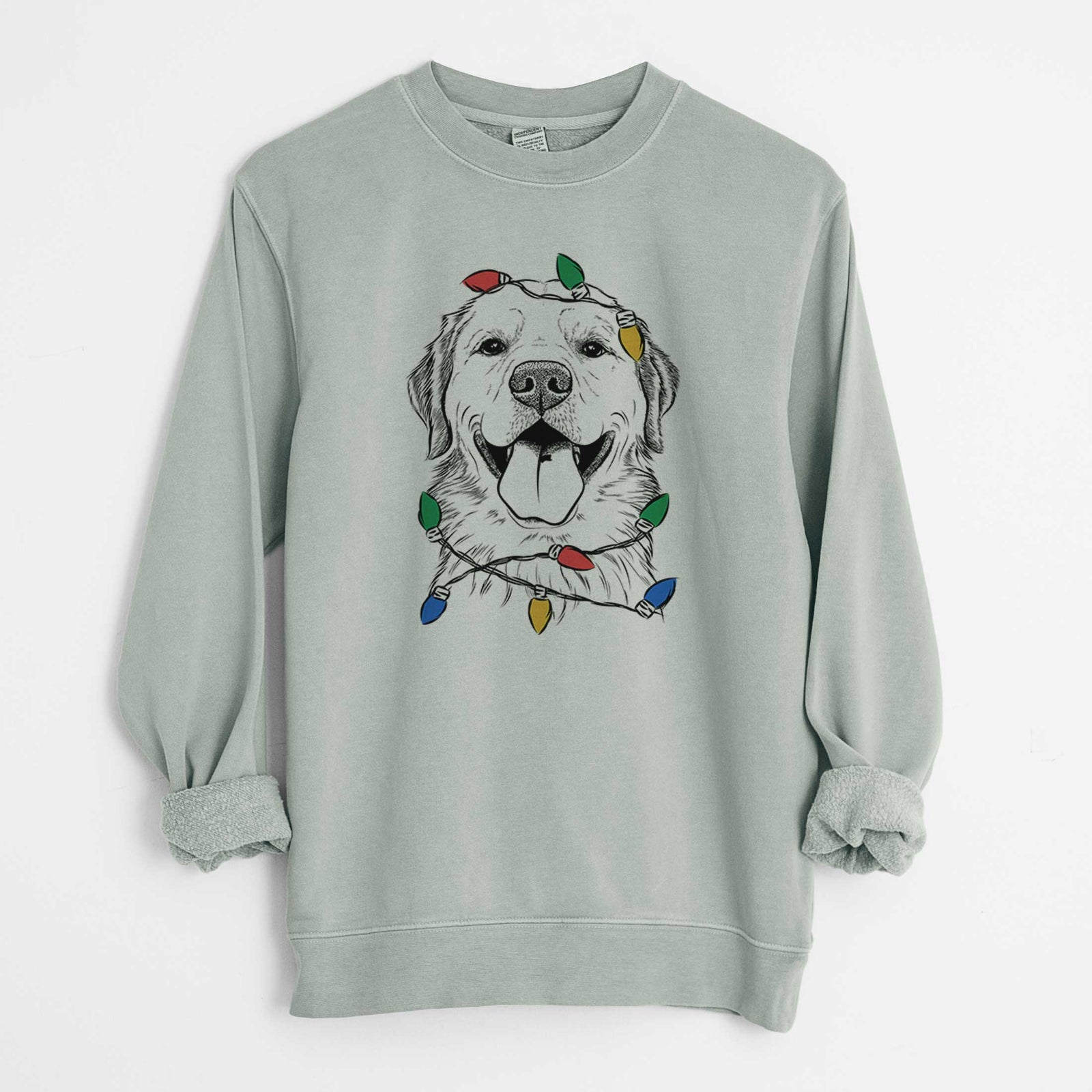Hand-drawn sketch of Bennett the Golden Retriever wrapped in Christmas lights on a Sage Unisex pigment dyed crew sweatshirt