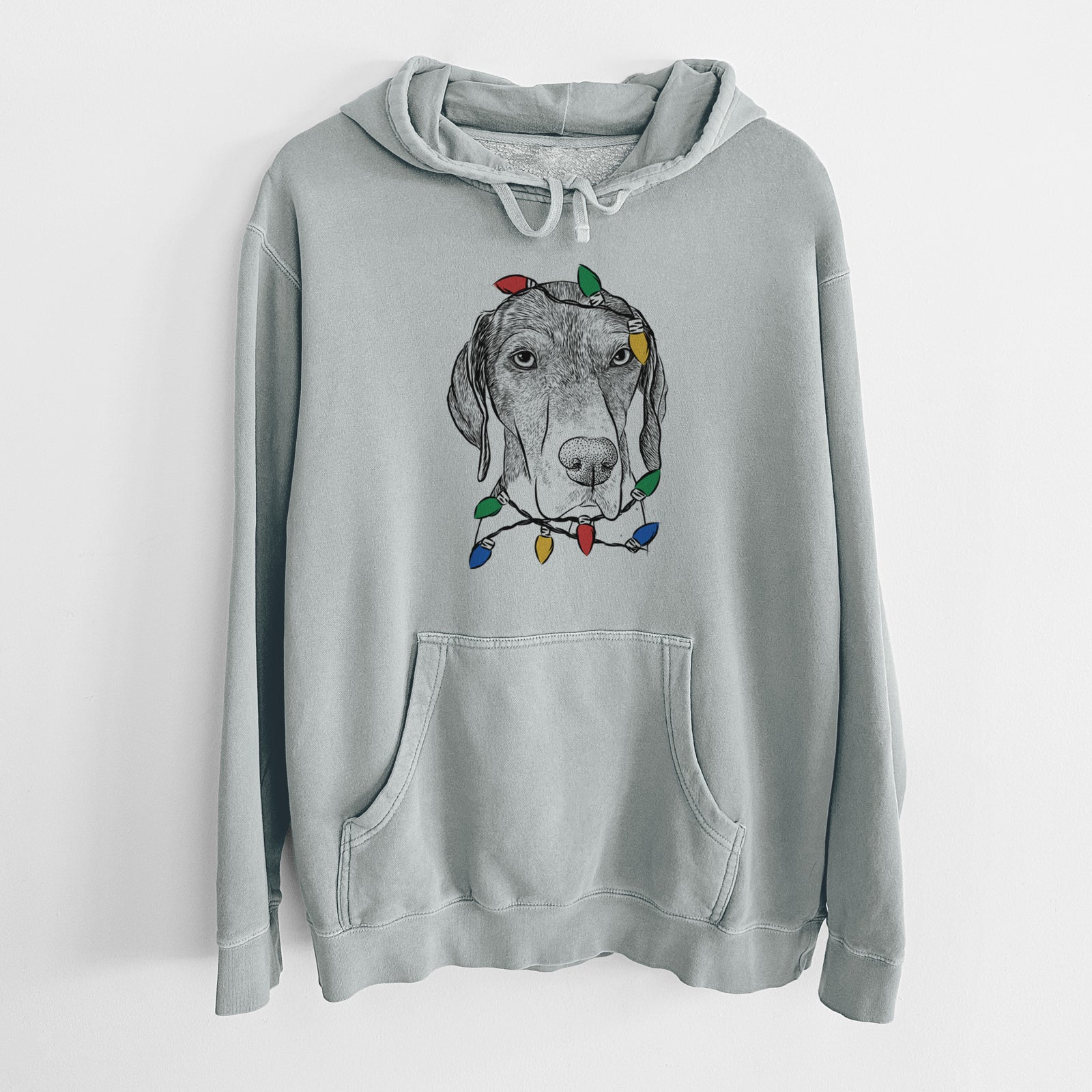 Hand-drawn sketch of Bohdi the German Shorthaired Pointer wrapped in Christmas lights on a Sage Unisex pigment dyed hoodie