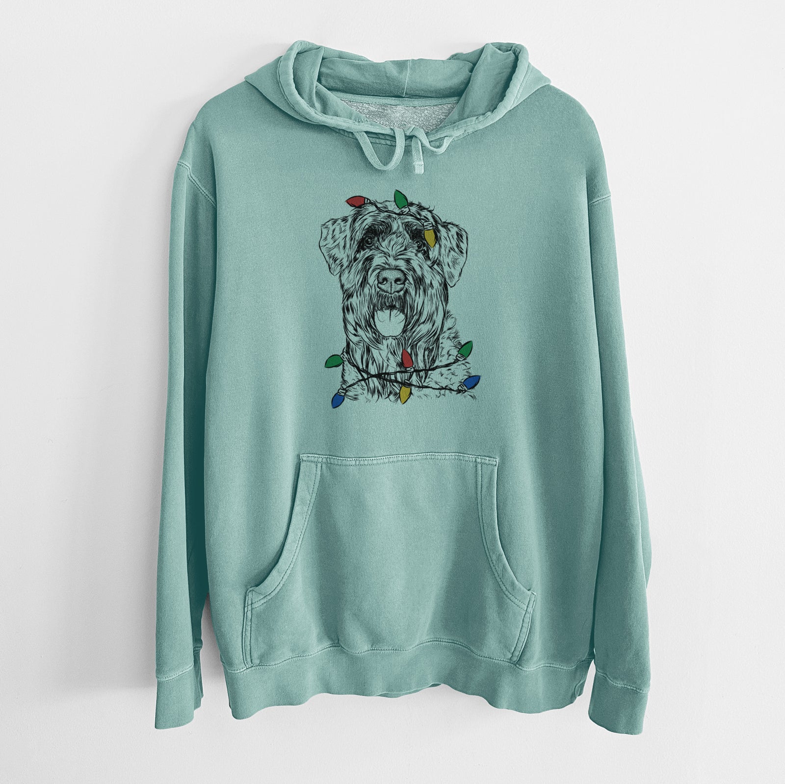Hand-drawn sketch of Bonnie the Bouvier Des Flandres wrapped in Christmas lights on a Mint Unisex pigment dyed hoodie