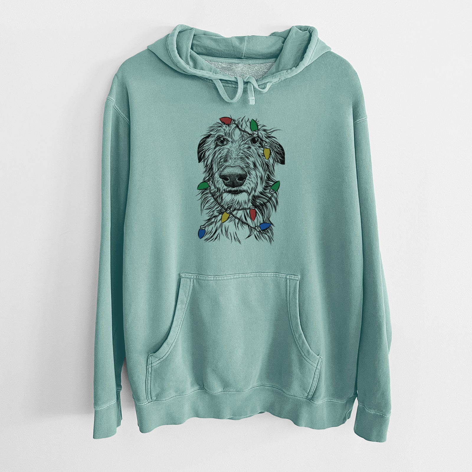 Hand-drawn sketch of Cleod the Scottish Deerhound wrapped in Christmas lights on a Mint Unisex pigment dyed hoodie
