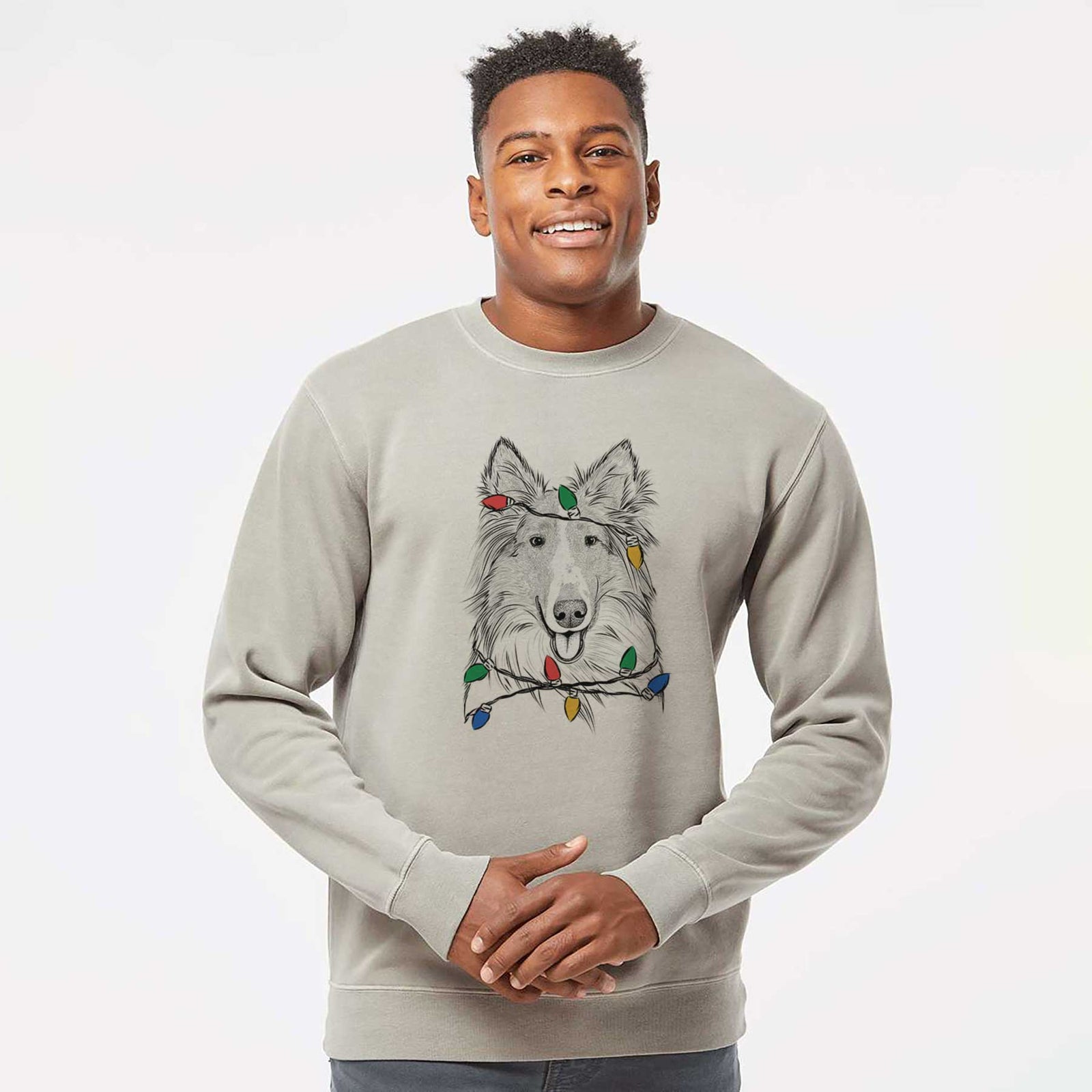 Hand-drawn sketch of Conrad the Rough Collie wrapped in Christmas lights on a Cement Unisex pigment dyed crew sweatshirt
