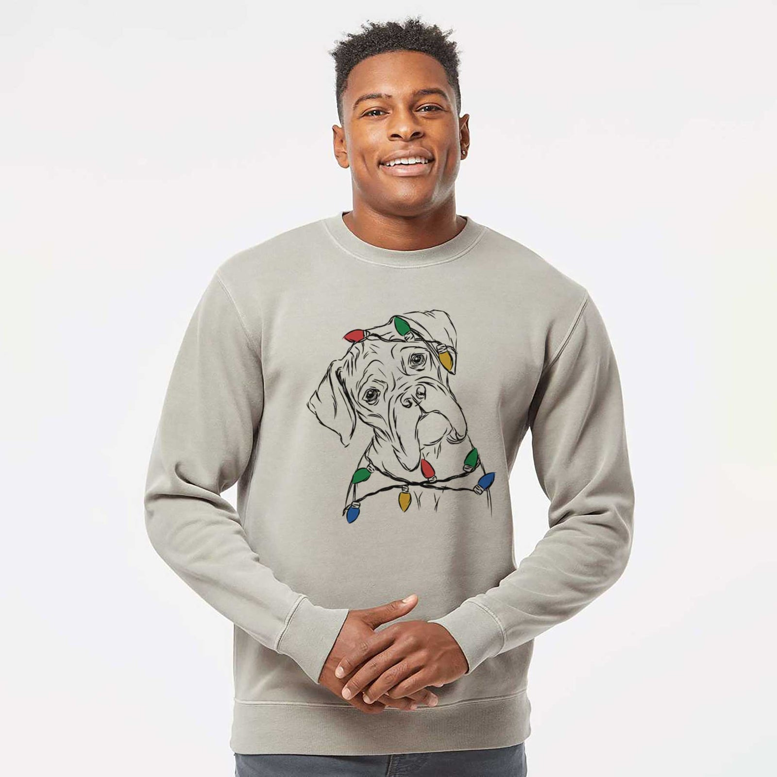 Hand-drawn sketch of Cooper the Boxer wrapped in Christmas lights on a Cement Unisex pigment dyed crew sweatshirt