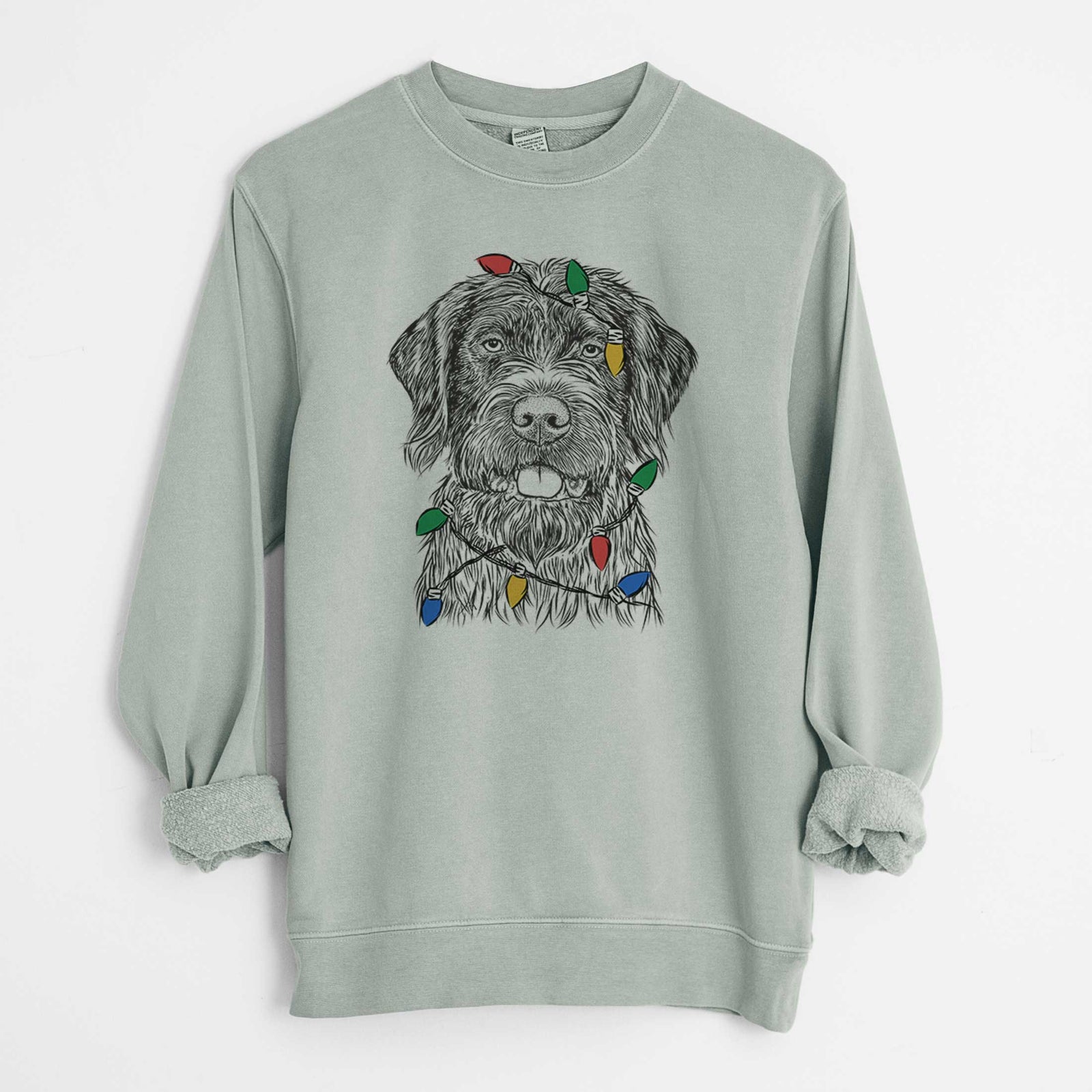 Hand-drawn sketch of Fletcher the Wirehaired Pointing Griffon wrapped in Christmas lights on a Sage Unisex pigment dyed crew sweatshirt