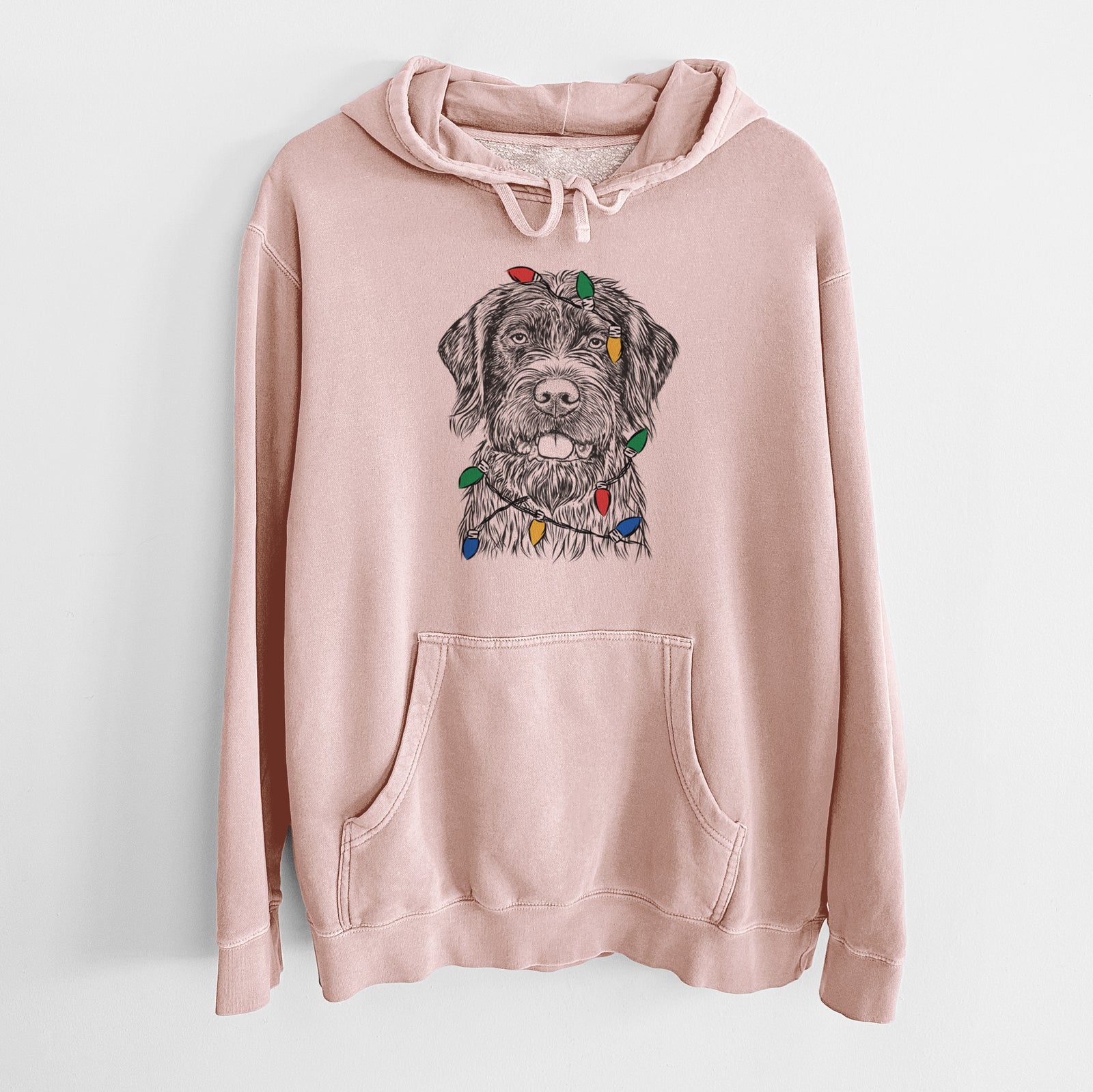 Hand-drawn sketch of Fletcher the Wirehaired Pointing Griffon wrapped in Christmas lights on a Dusty Pink Unisex pigment dyed hoodie