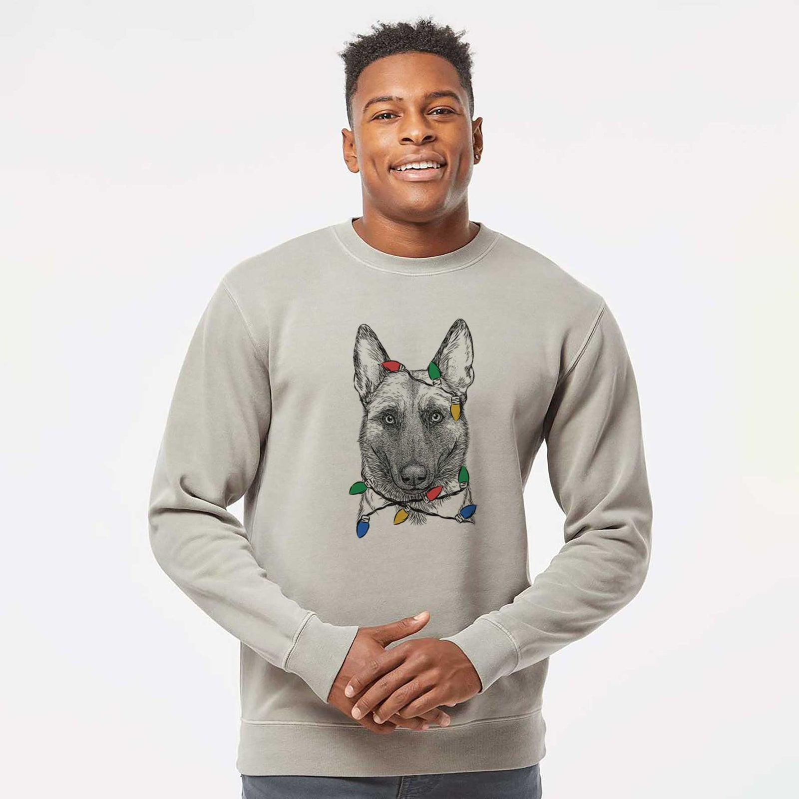 Hand-drawn sketch of Gunther the Belgian Malinois wrapped in Christmas lights on a Cement Unisex pigment dyed crew sweatshirt