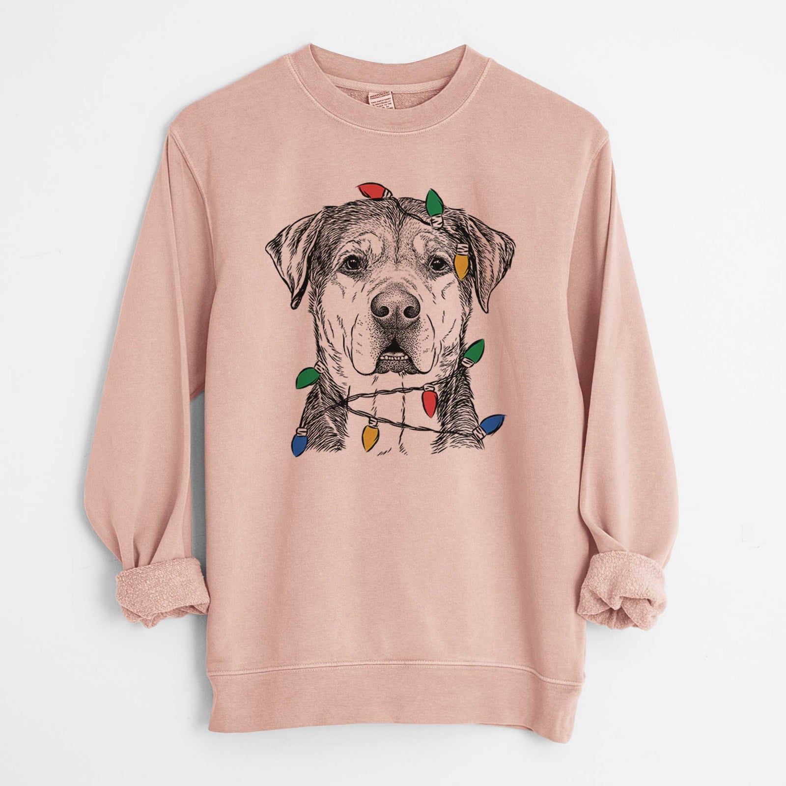 Hand-drawn sketch of Gus the Rottweiler Mix wrapped in Christmas lights on a Dusty Pink Unisex pigment dyed crew sweatshirt