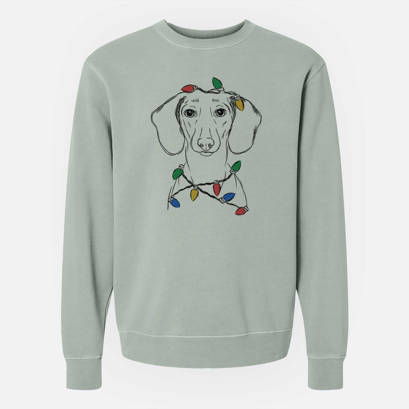Hand-drawn sketch of Hans the Dachshund wrapped in Christmas lights on a Sage Unisex pigment dyed crew sweatshirt