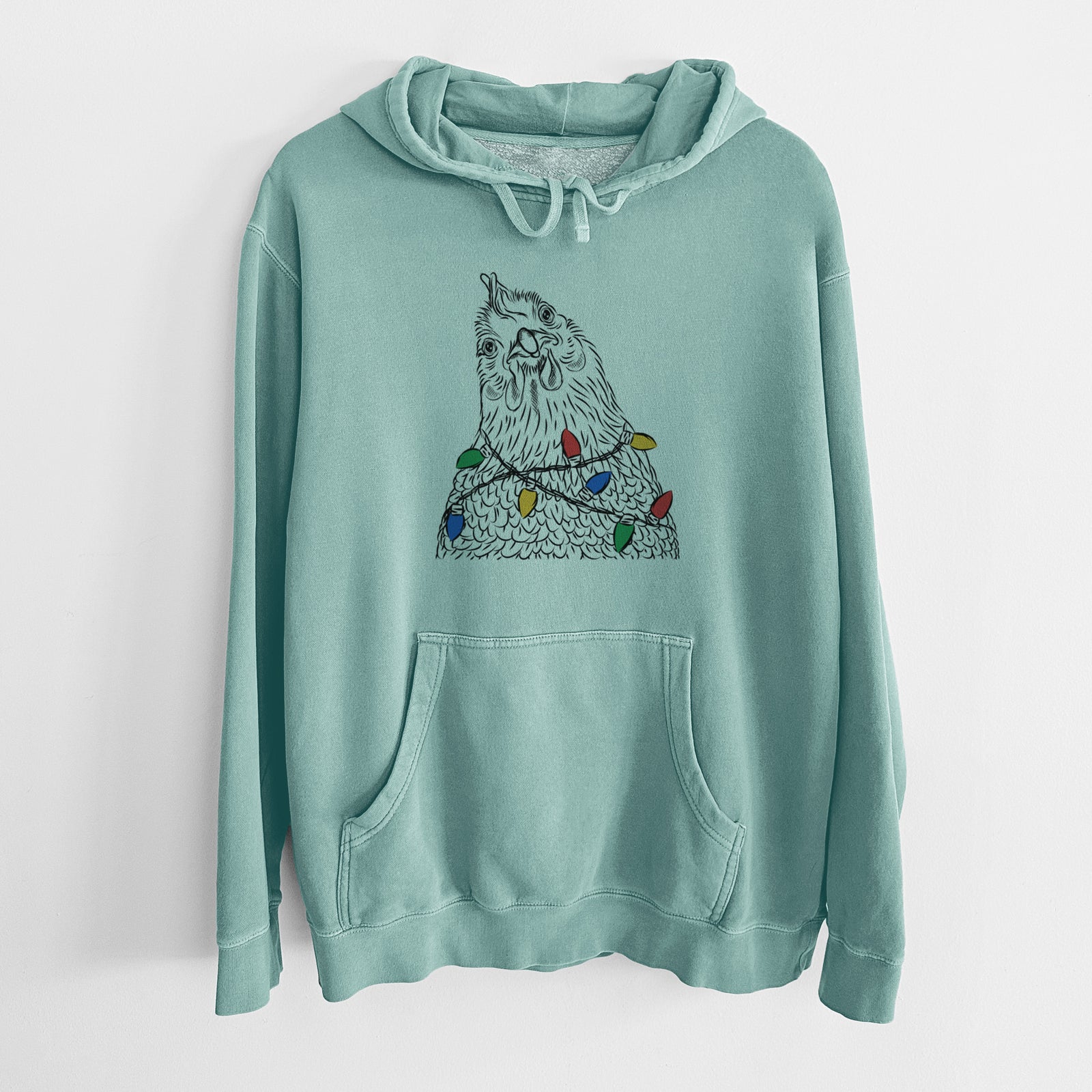 Hand-drawn sketch of Henrietta the Chicken wrapped in Christmas lights on a Mint Unisex pigment dyed hoodie