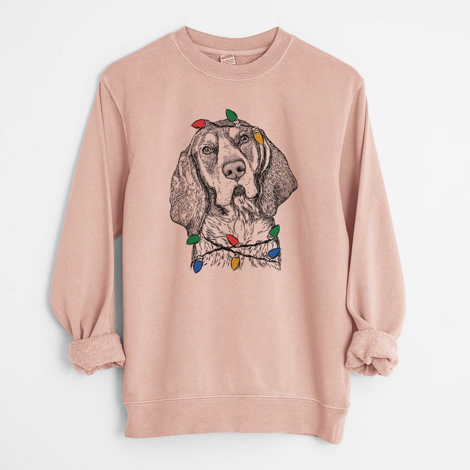Hand-drawn sketch of Huck the Bluetick Coonhound wrapped in Christmas lights on a Dusty Pink Unisex pigment dyed crew sweatshirt