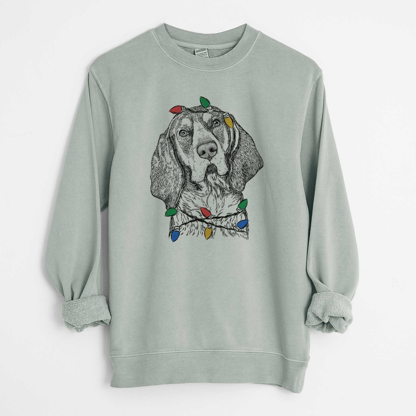 Hand-drawn sketch of Huck the Bluetick Coonhound wrapped in Christmas lights on a Sage Unisex pigment dyed crew sweatshirt